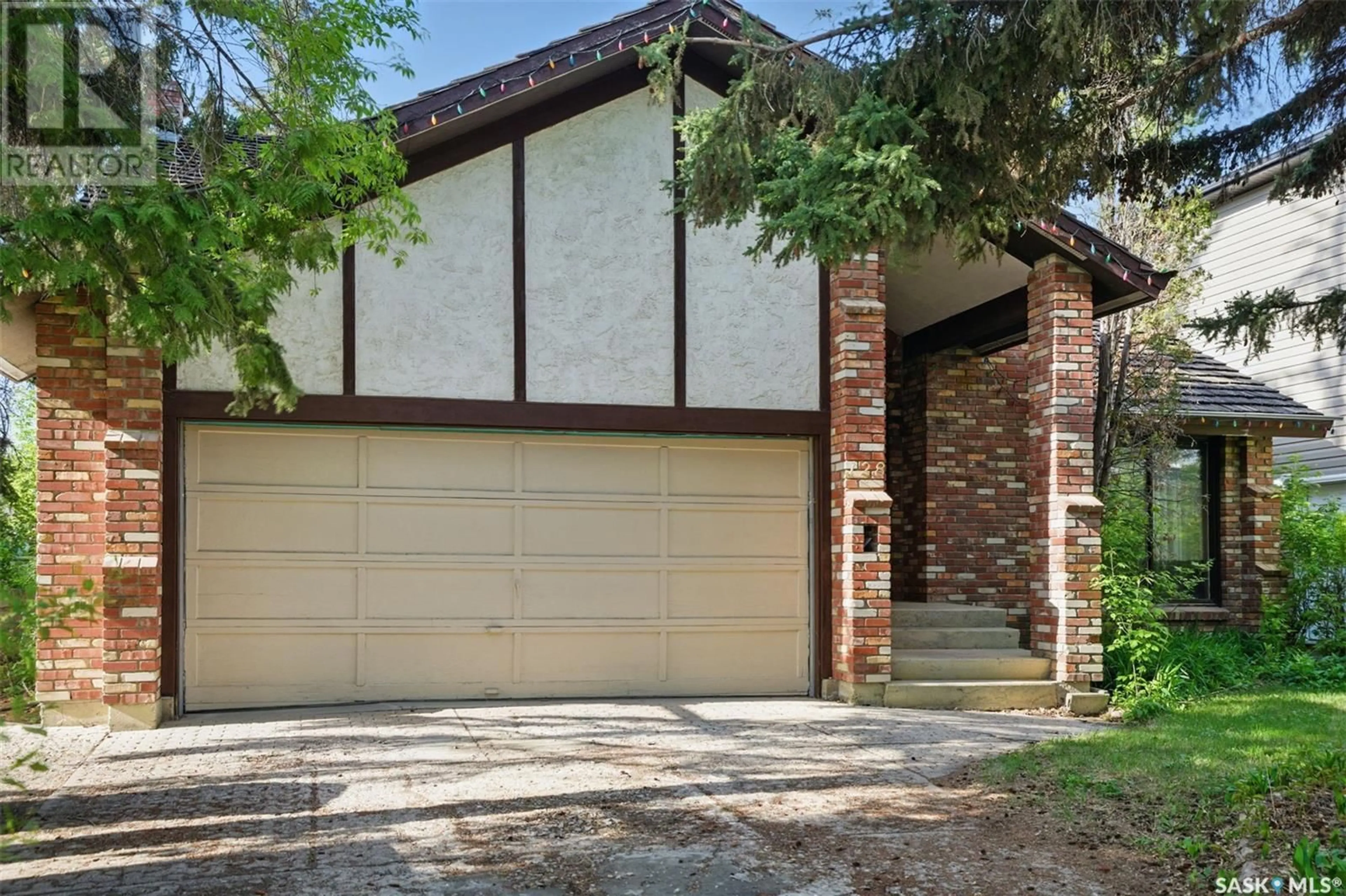 Home with brick exterior material, street for 128 112TH STREET, Saskatoon Saskatchewan S7N1T9