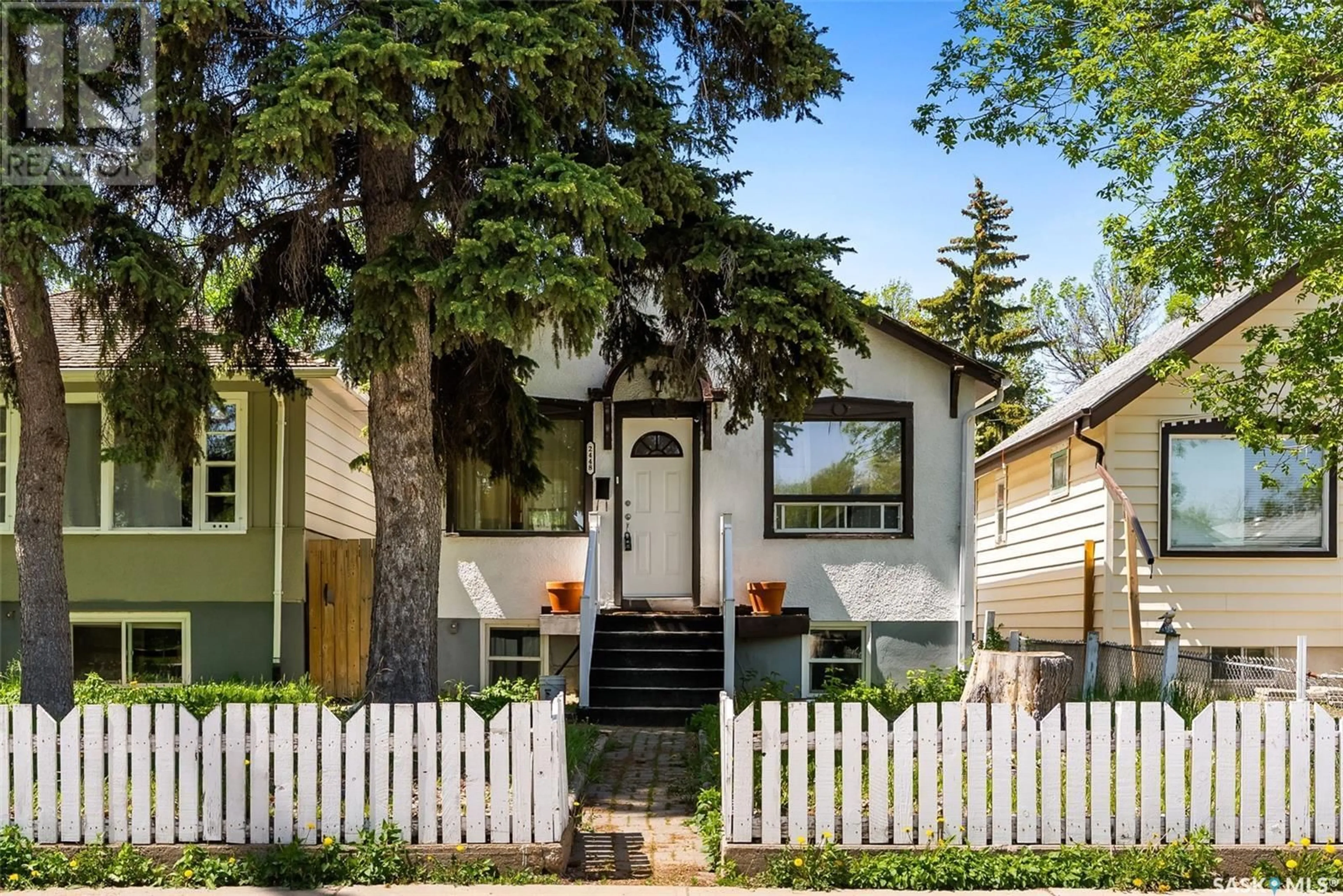Home with vinyl exterior material, street for 2448 EDGAR STREET, Regina Saskatchewan S4N3L3