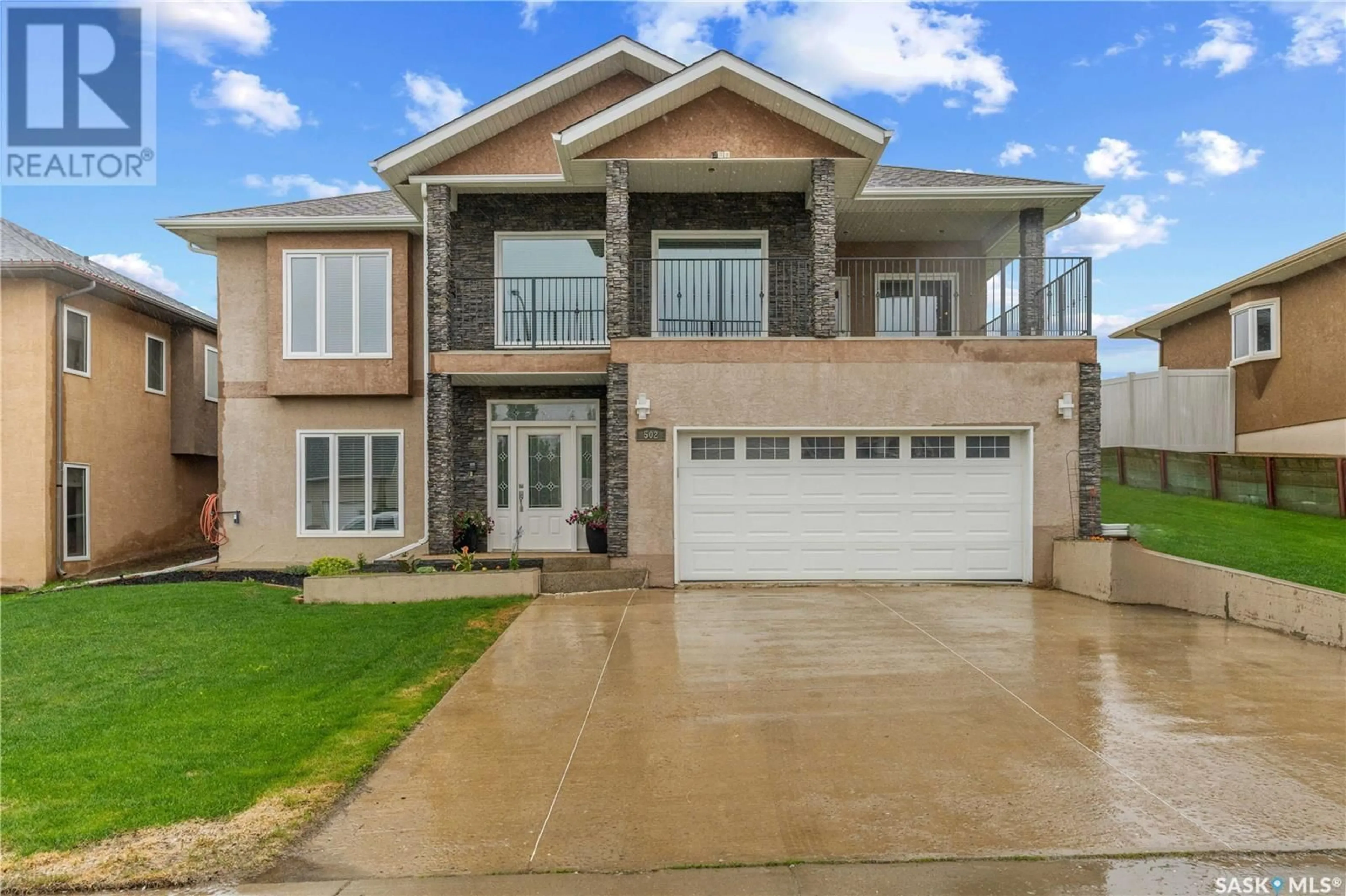 Home with vinyl exterior material, street for 502 ASPEN DRIVE, Swift Current Saskatchewan S9H5E4