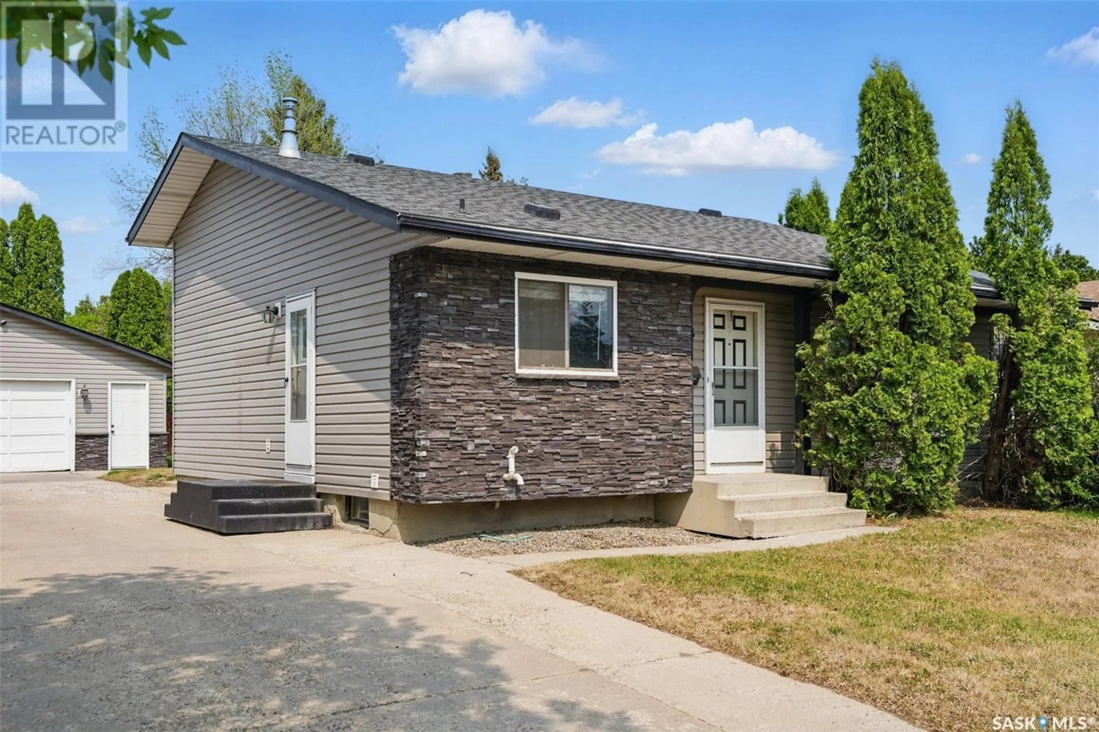 Home with vinyl exterior material, street for 3827 TAYLOR STREET, Saskatoon Saskatchewan S7H5J4