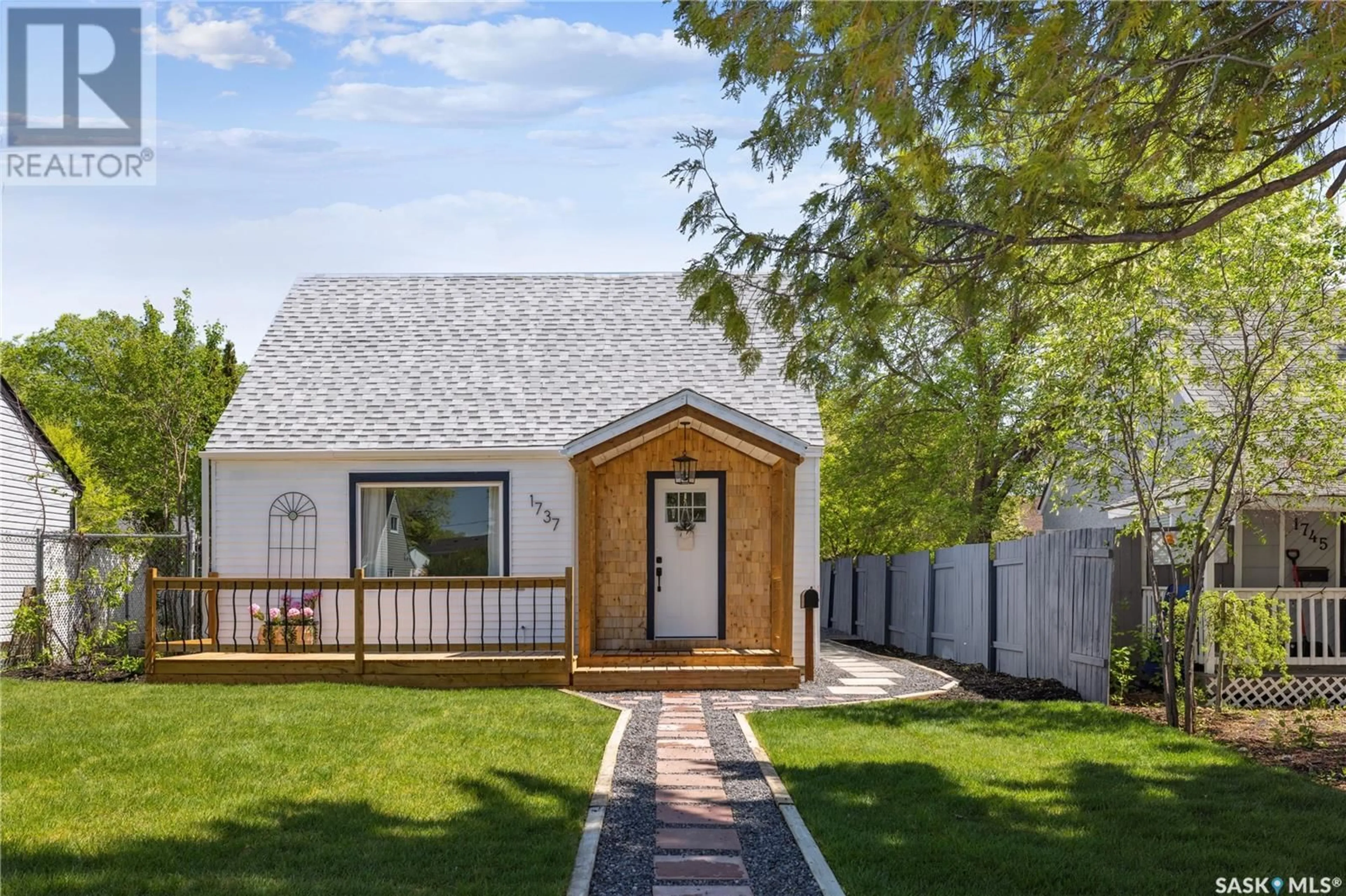 Home with vinyl exterior material, street for 1737 MCINTOSH STREET, Regina Saskatchewan S4T5C6