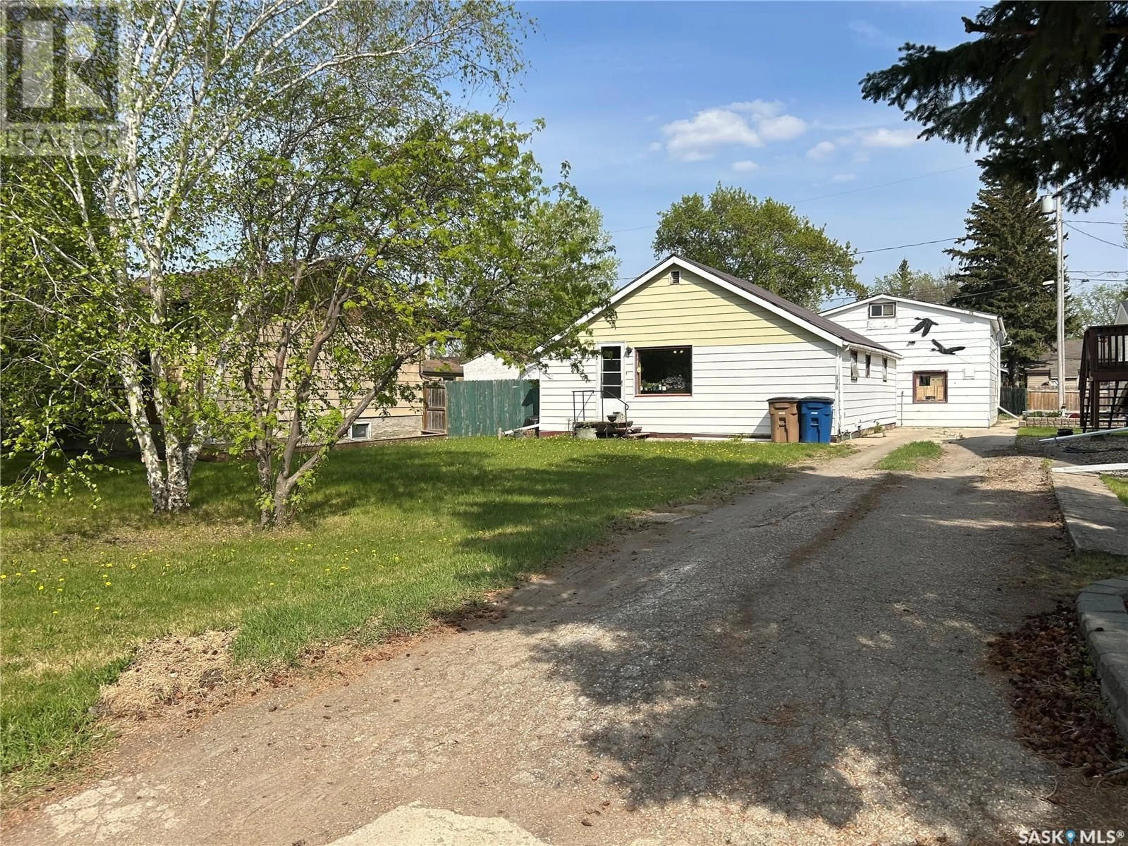 A pic from outside/outdoor area/front of a property/back of a property/a pic from drone, street for 1310 96TH STREET, Tisdale Saskatchewan S0E1T0