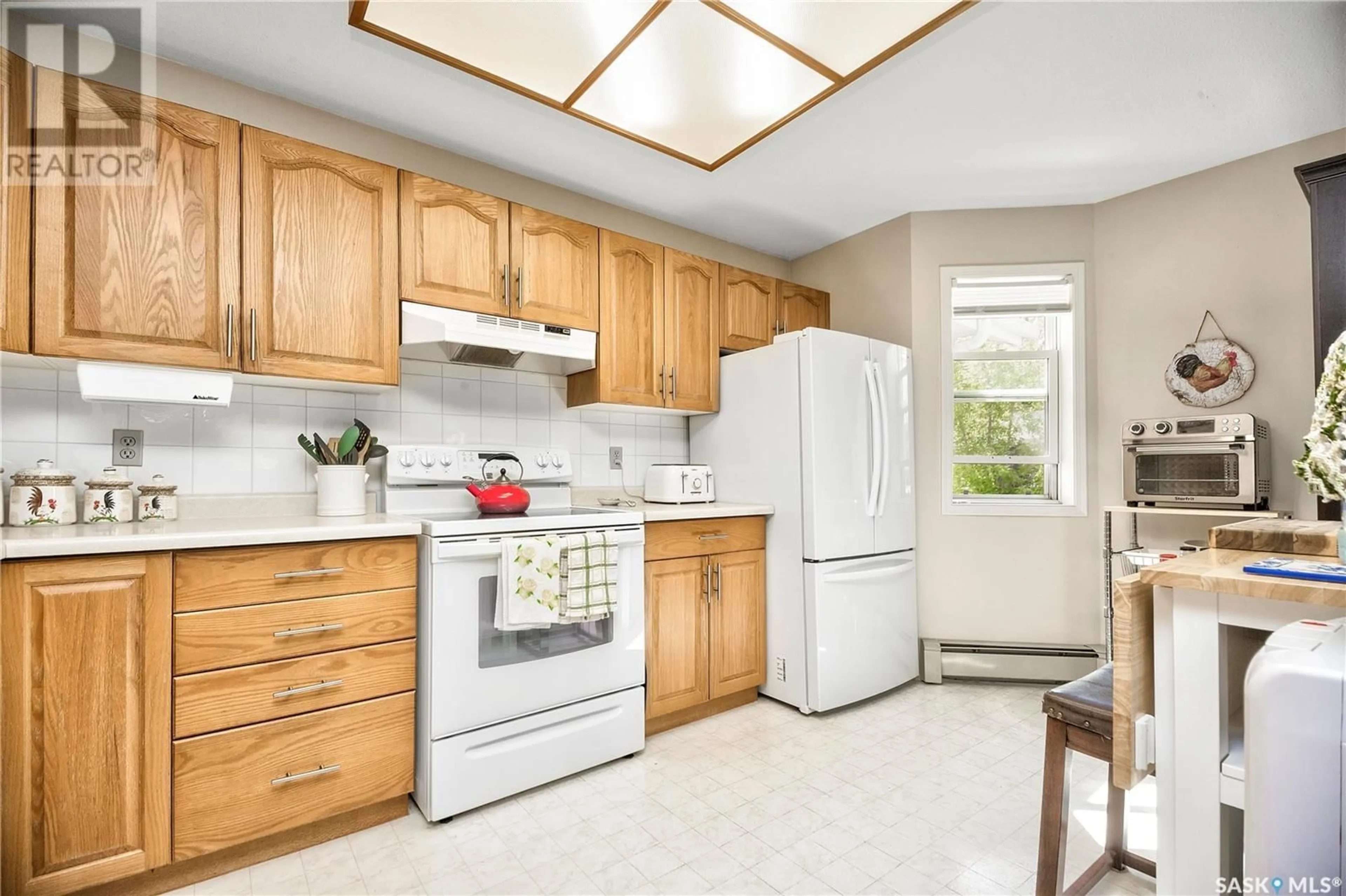 Standard kitchen, ceramic/tile floor for 103 - 2405 1ST AVENUE, Prince Albert Saskatchewan S6V5A2
