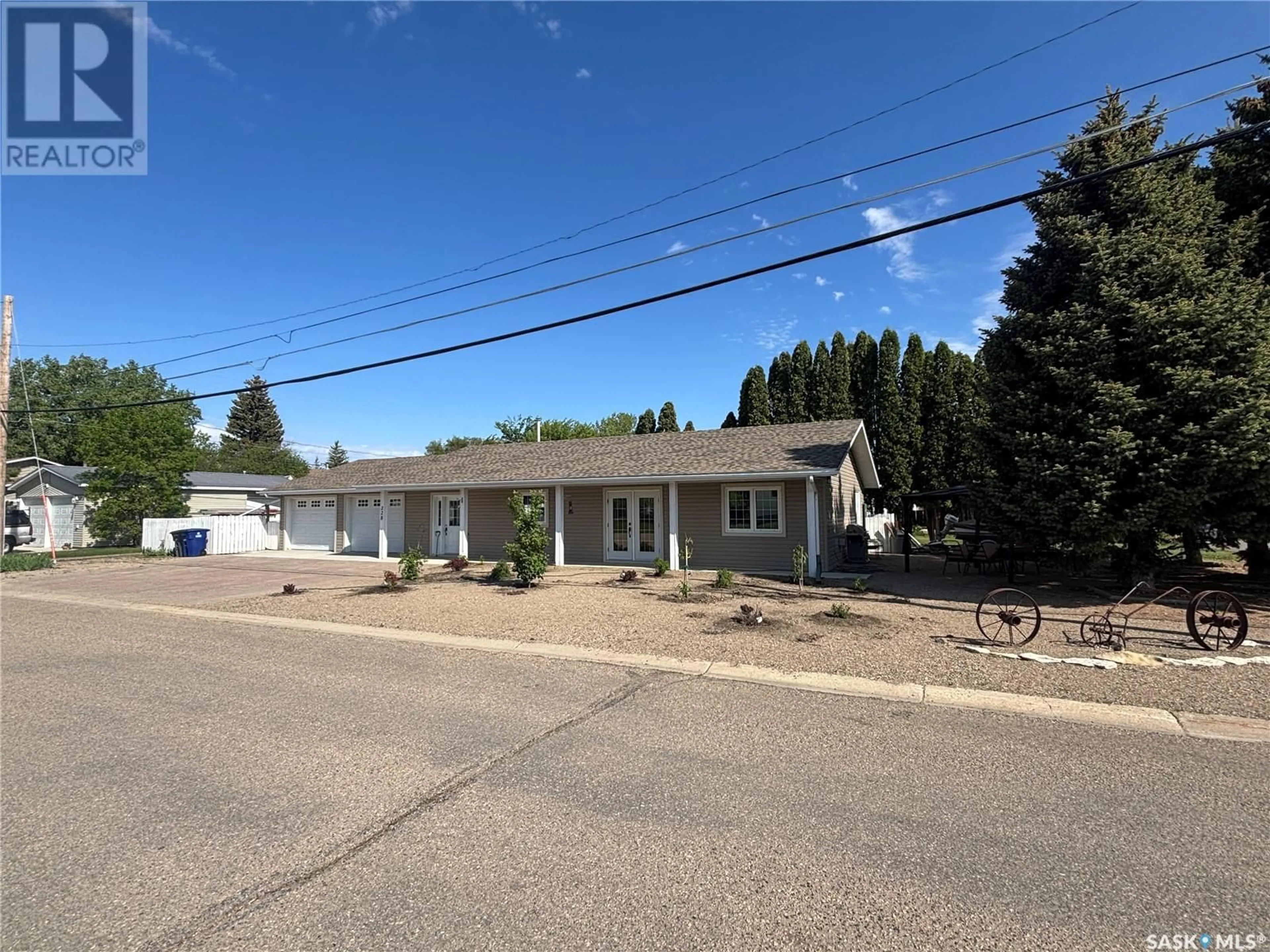A pic from outside/outdoor area/front of a property/back of a property/a pic from drone, street for 228 HEARN STREET, Outlook Saskatchewan S0L2N0