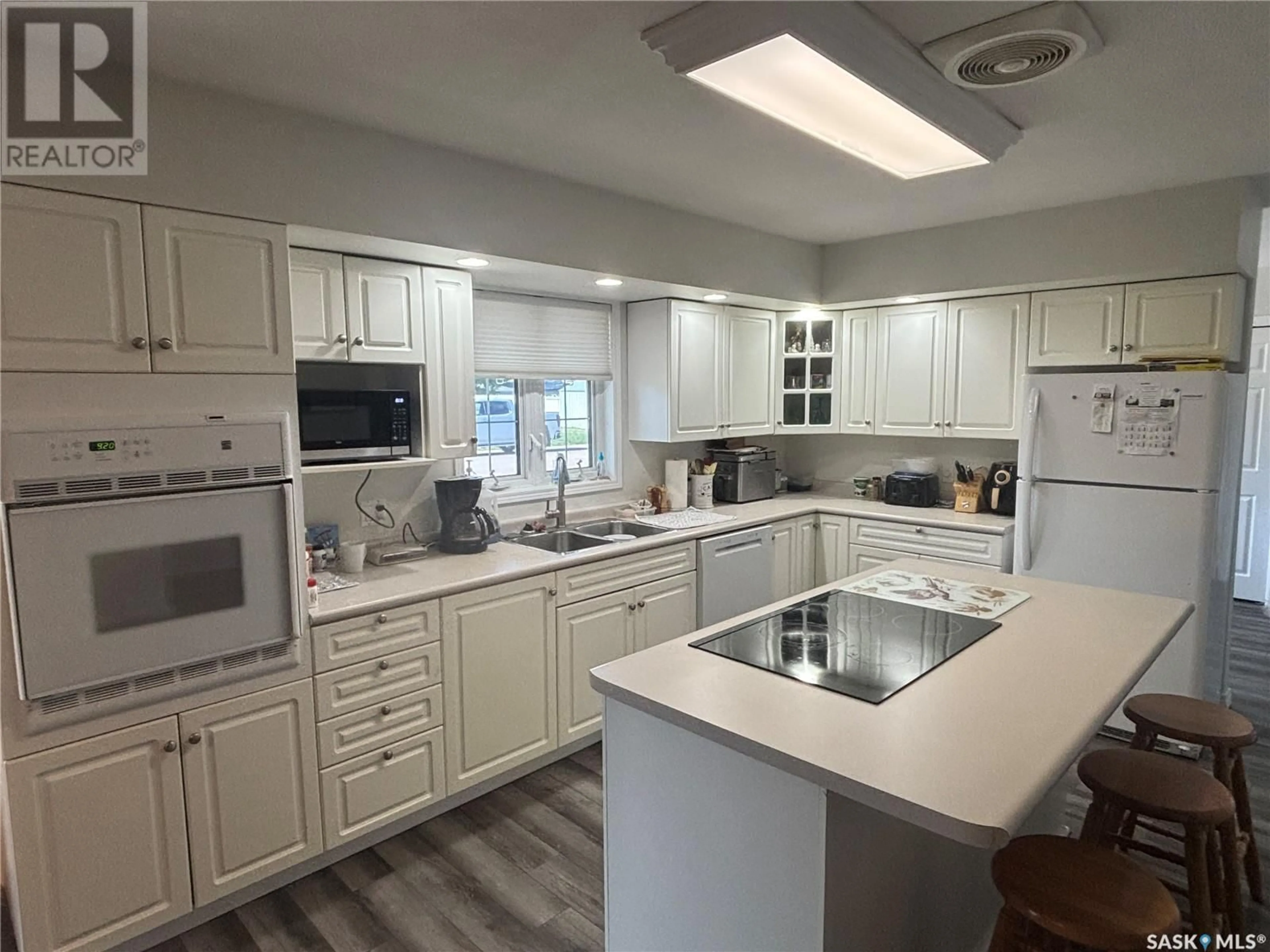Open concept kitchen, ceramic/tile floor for 228 HEARN STREET, Outlook Saskatchewan S0L2N0