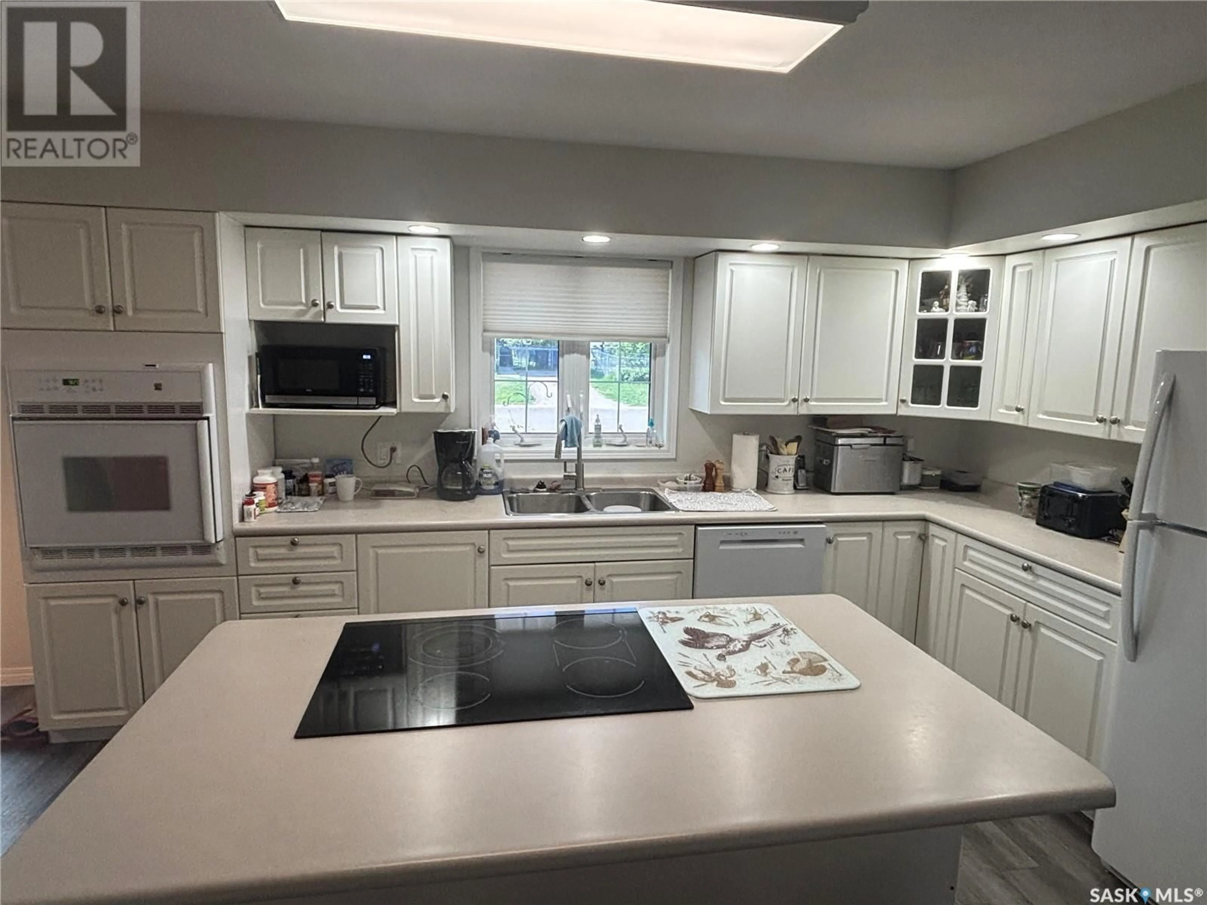 Open concept kitchen, ceramic/tile floor for 228 HEARN STREET, Outlook Saskatchewan S0L2N0