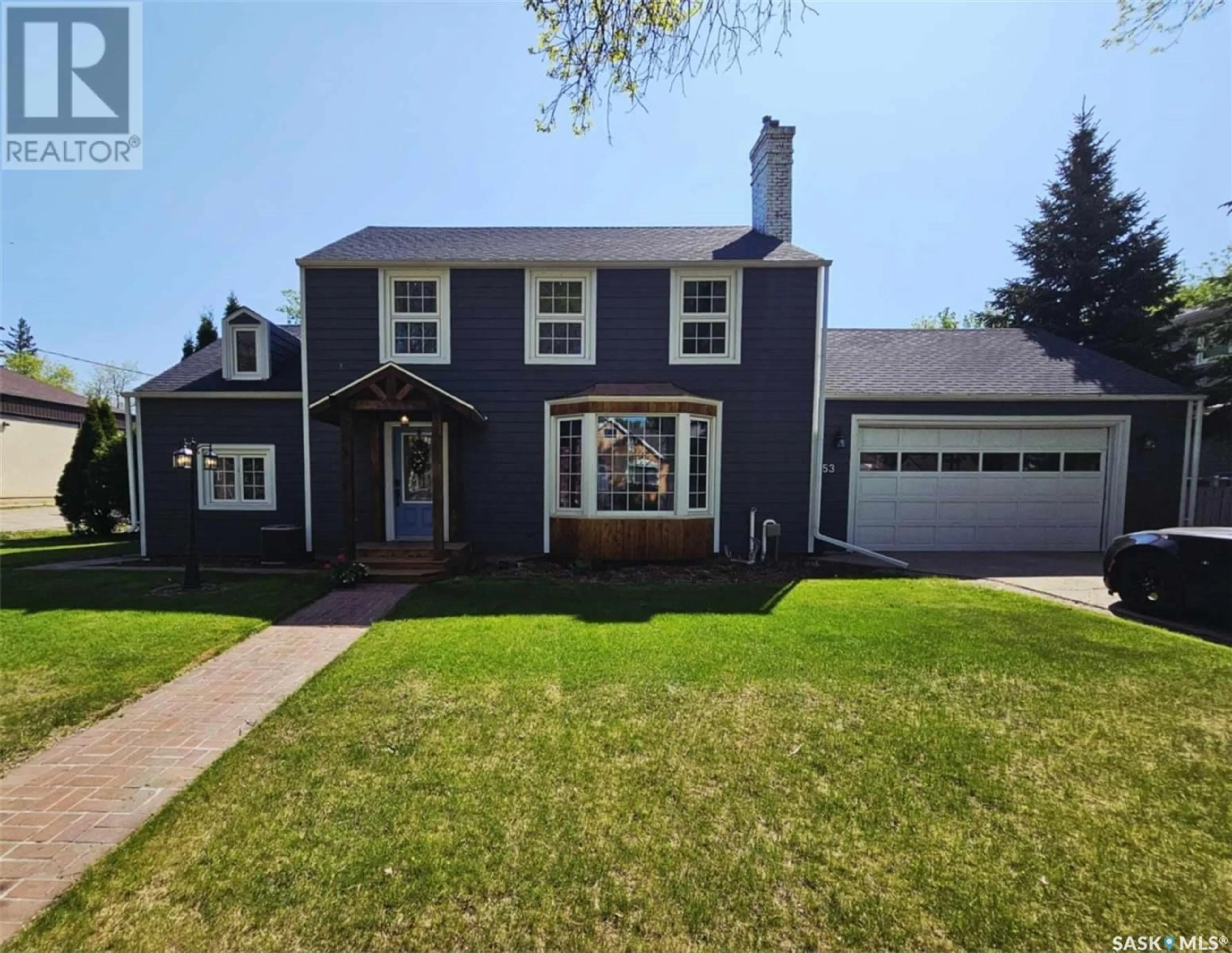 Home with vinyl exterior material, street for 153 2ND AVENUE, Yorkton Saskatchewan S3N1G5