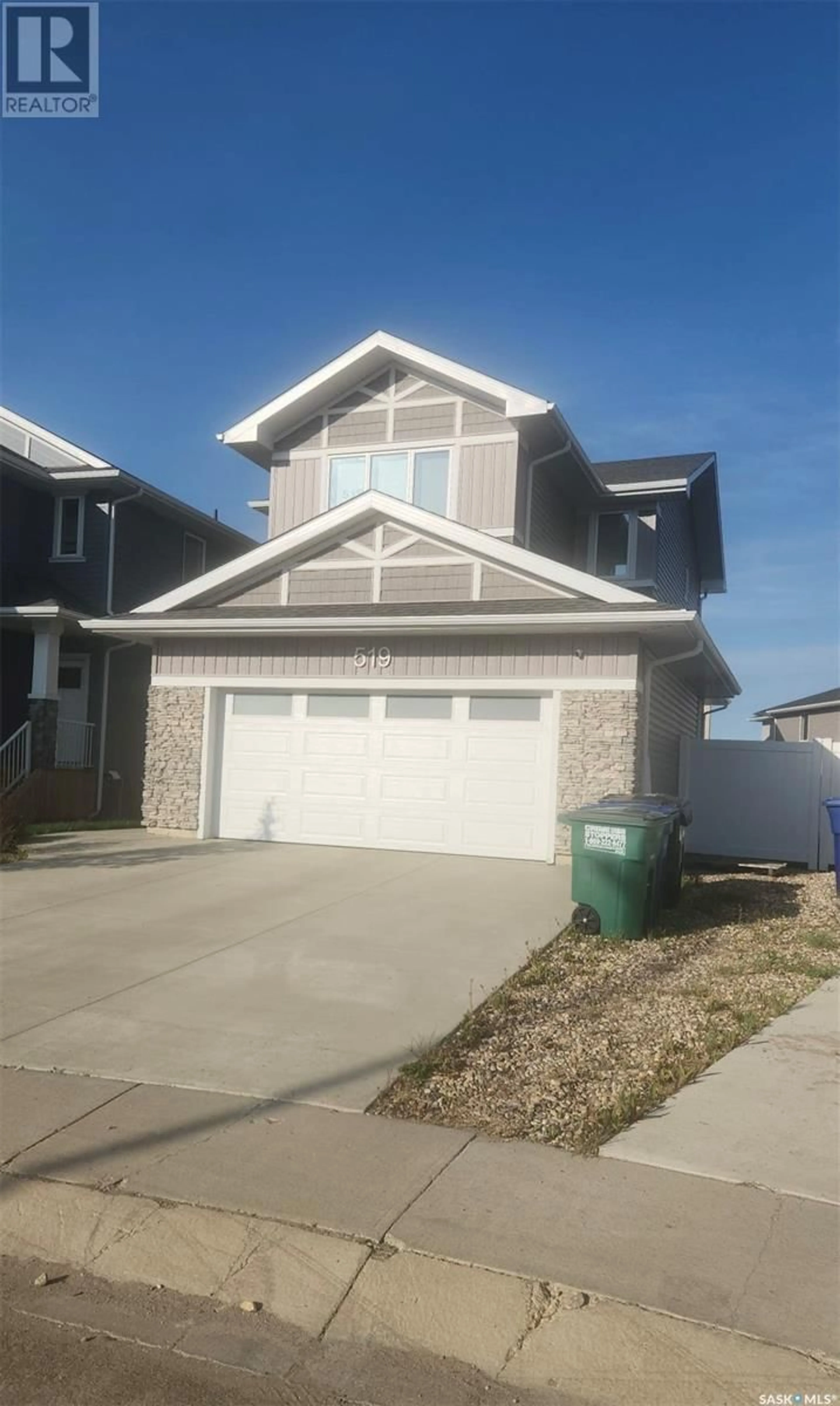 Home with vinyl exterior material, street for 519 MCFAULL CRESCENT, Saskatoon Saskatchewan S7V0T1