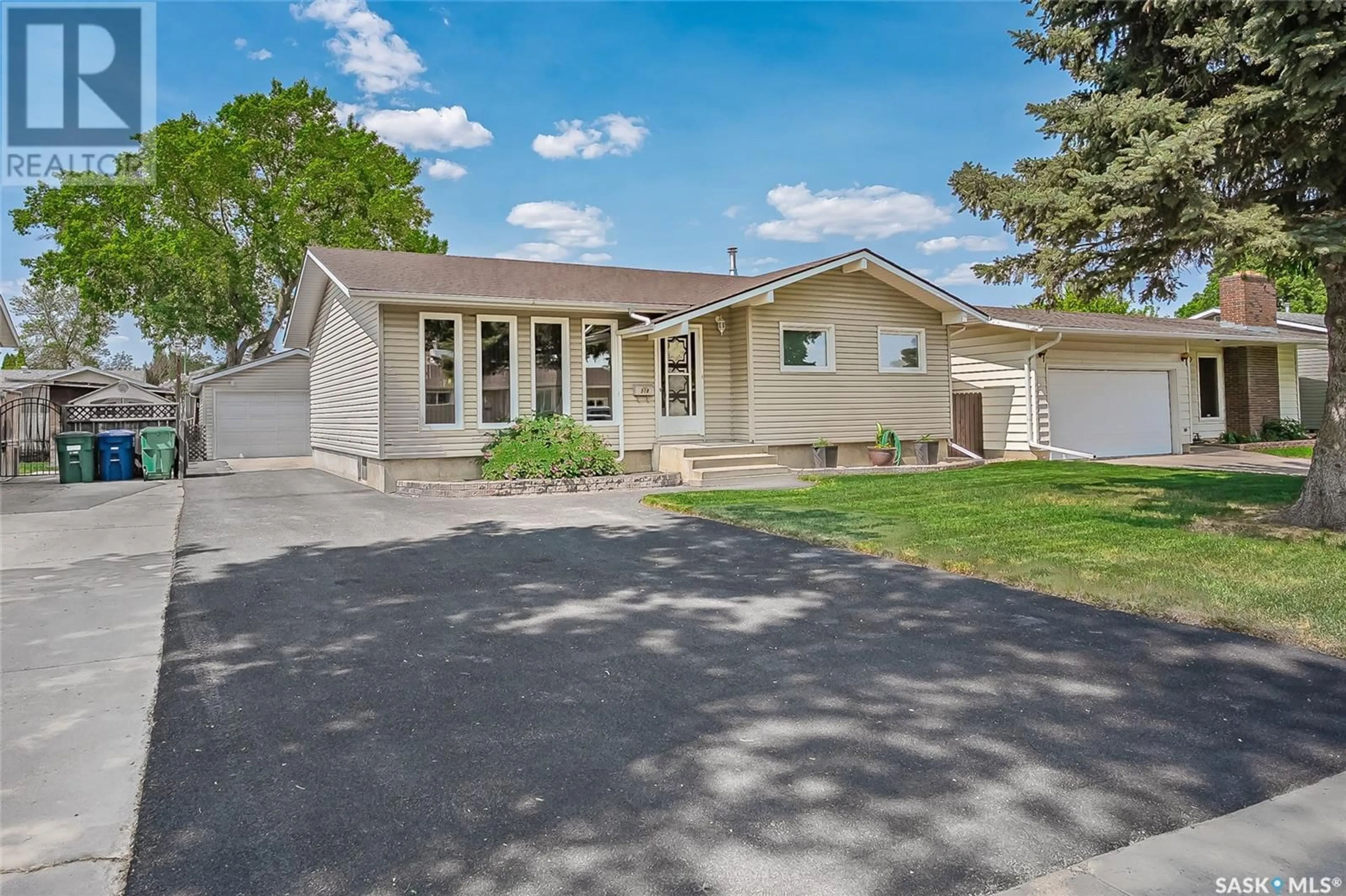 Home with vinyl exterior material, street for 518 FORRESTER ROAD, Saskatoon Saskatchewan S7M4G6