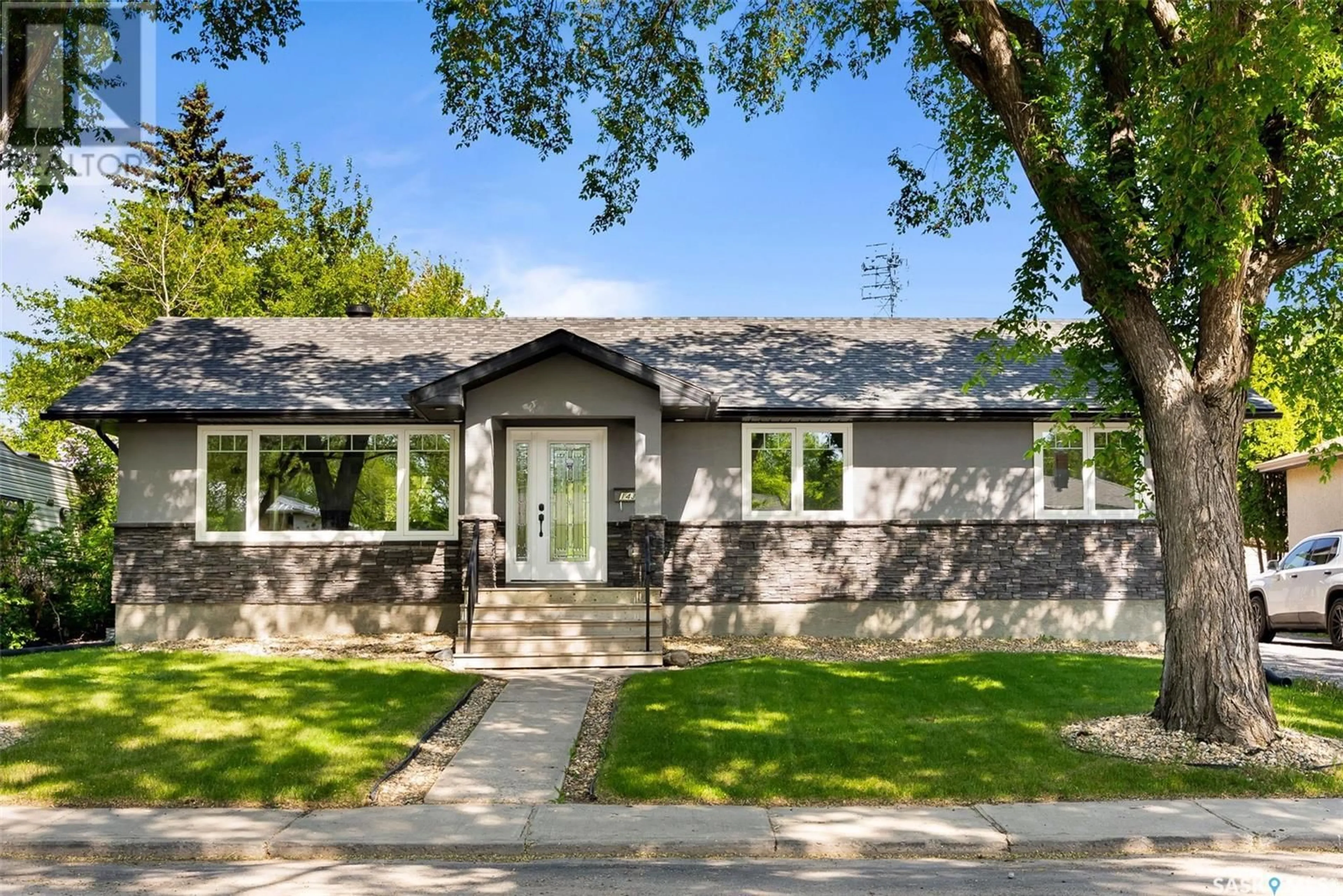 Home with vinyl exterior material, street for 143 MONTREAL STREET, Regina Saskatchewan S4R2S8