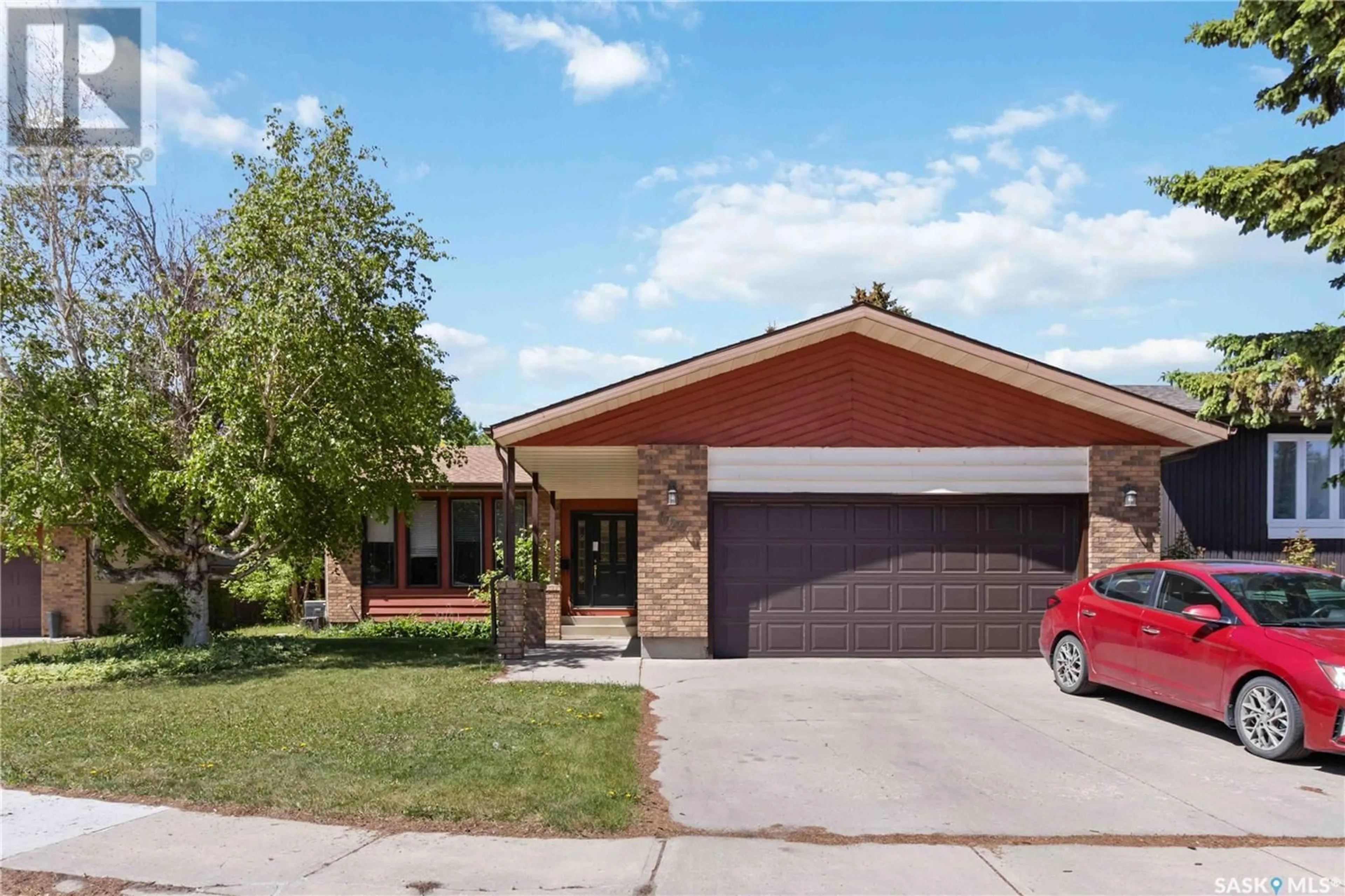 Home with brick exterior material, street for 622 WOLLASTON BAY, Saskatoon Saskatchewan S7J4C3