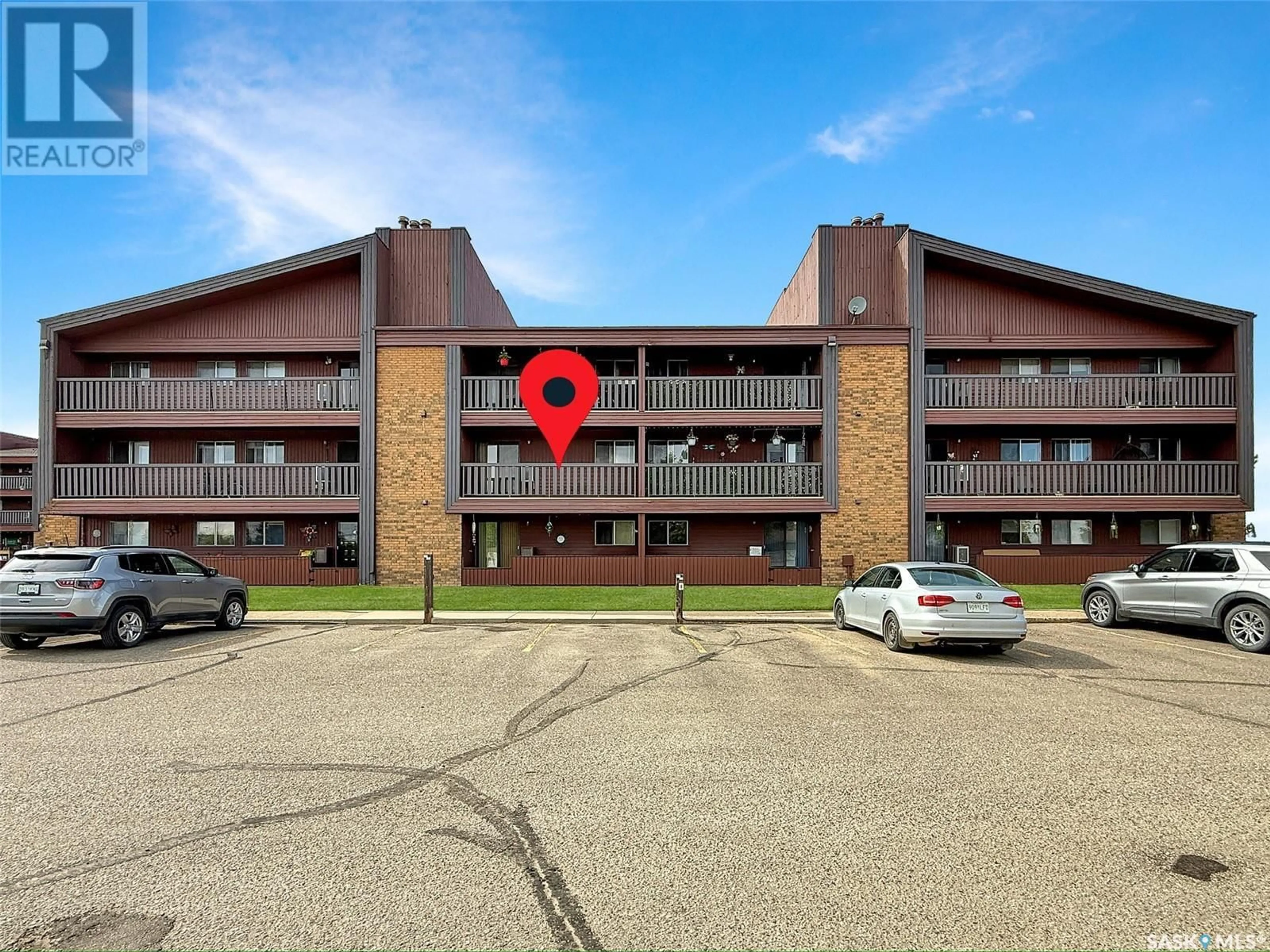A pic from outside/outdoor area/front of a property/back of a property/a pic from drone, building for 207 - 1110 9TH AVENUE, Swift Current Saskatchewan S9H2S9