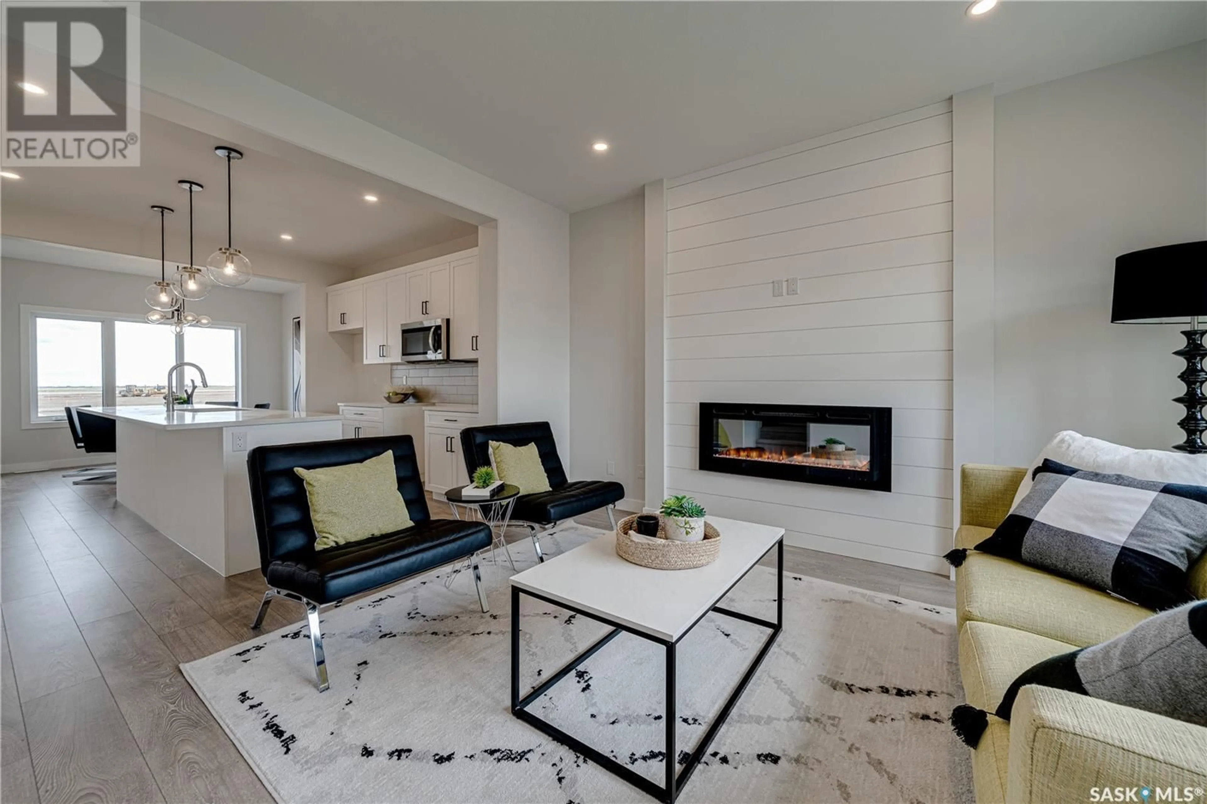 Living room with furniture, ceramic/tile floor for 3167 BOWEN STREET, Regina Saskatchewan S4N7K9