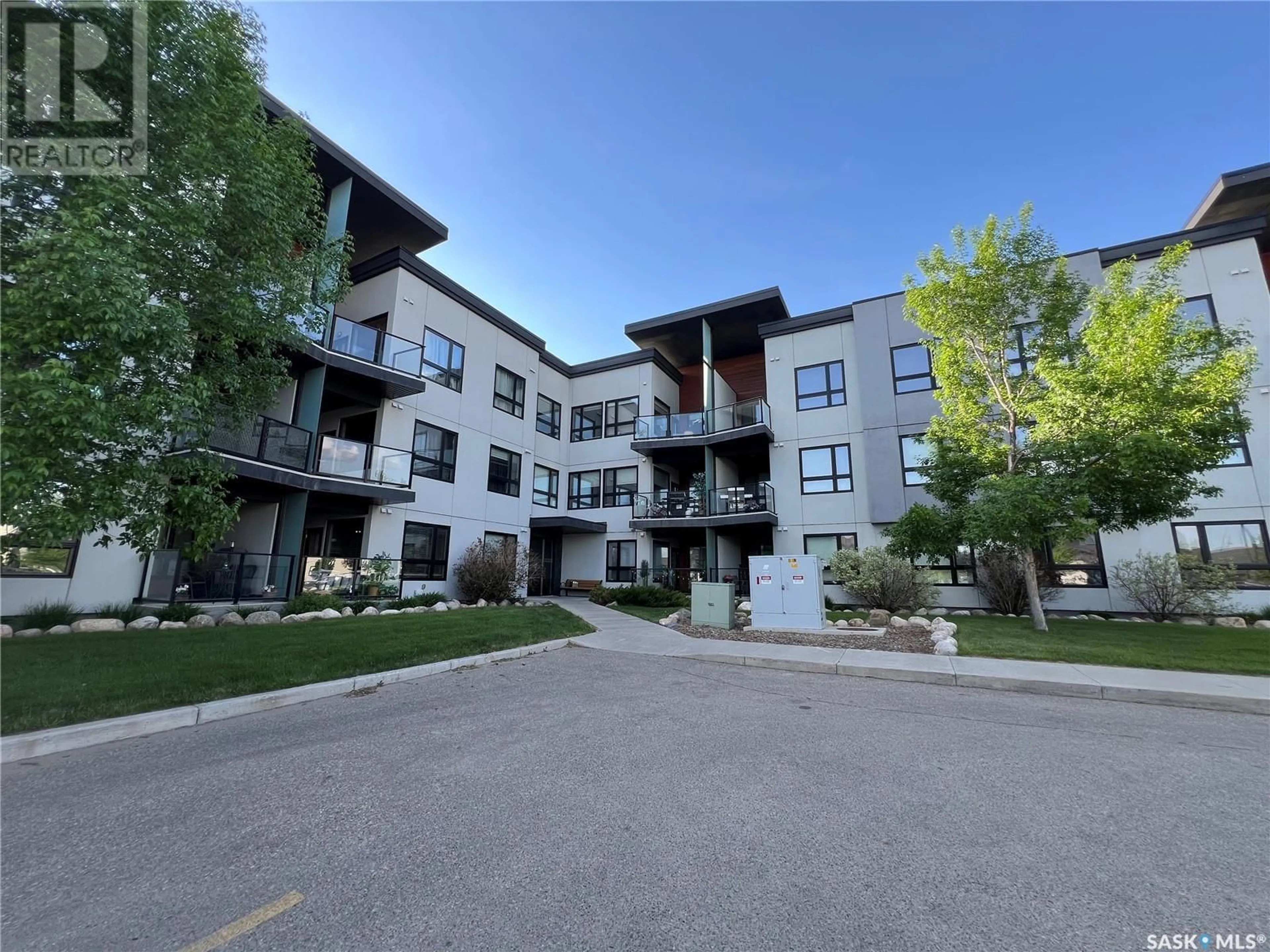 A pic from outside/outdoor area/front of a property/back of a property/a pic from drone, unknown for 309 225 MANINGAS BEND, Saskatoon Saskatchewan S7W0P9