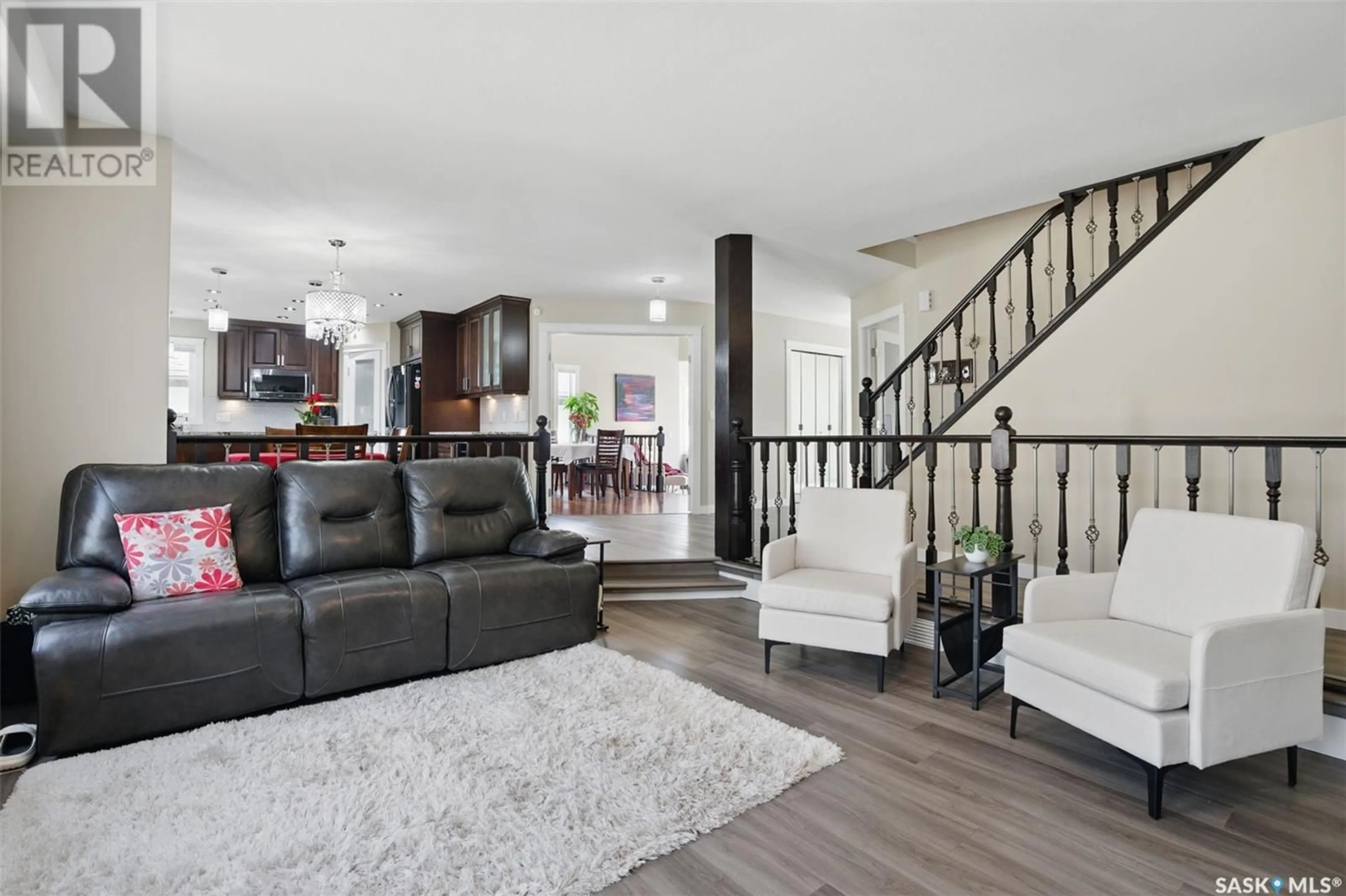 Living room with furniture, unknown for 203 MALLIN CRESCENT, Saskatoon Saskatchewan S7K7W8