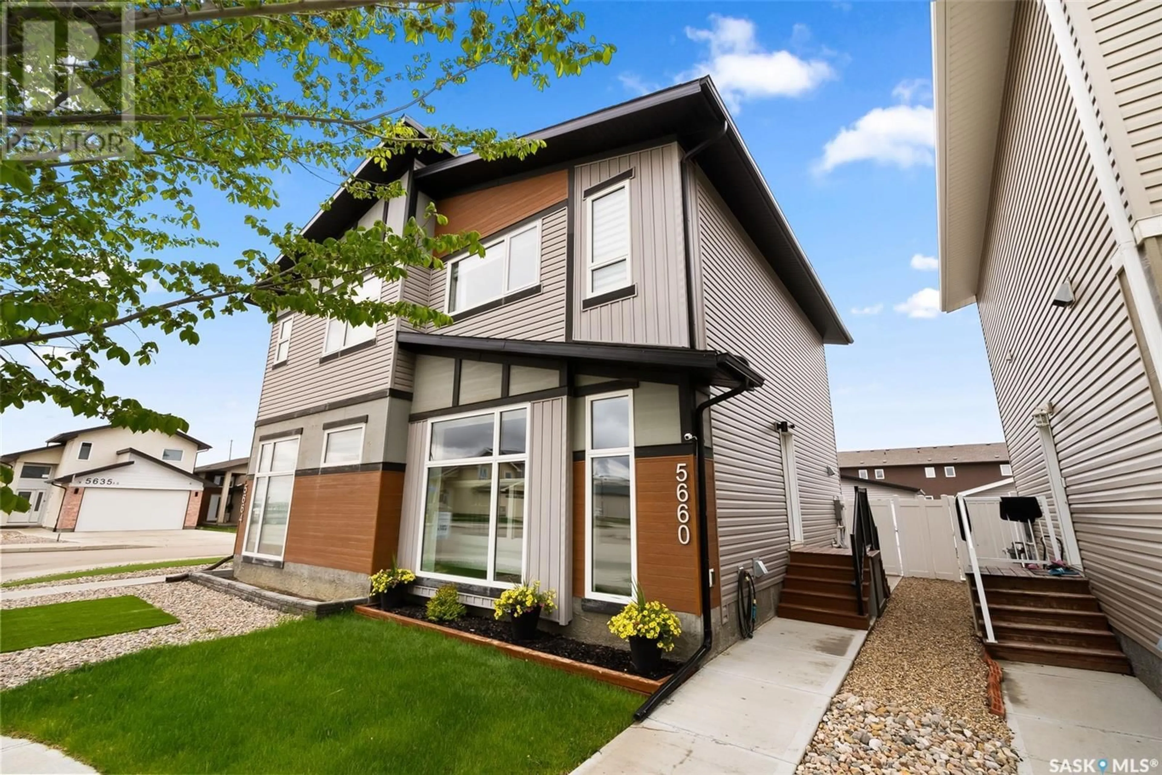 Home with brick exterior material, street for 5660 TUTOR WAY, Regina Saskatchewan S4W0N5