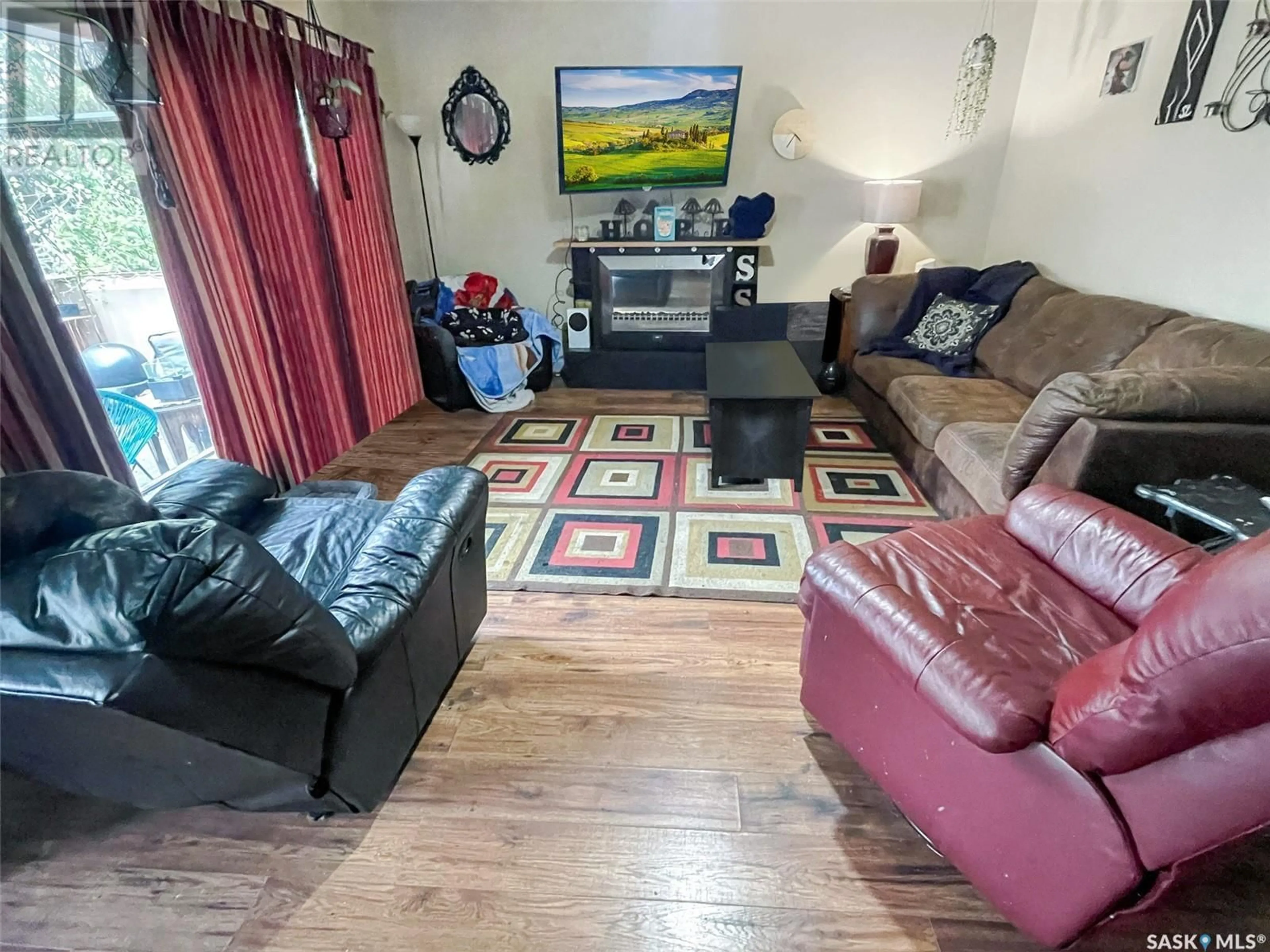 Living room with furniture, unknown for 314 10TH AVENUE, Swift Current Saskatchewan S9H1B6