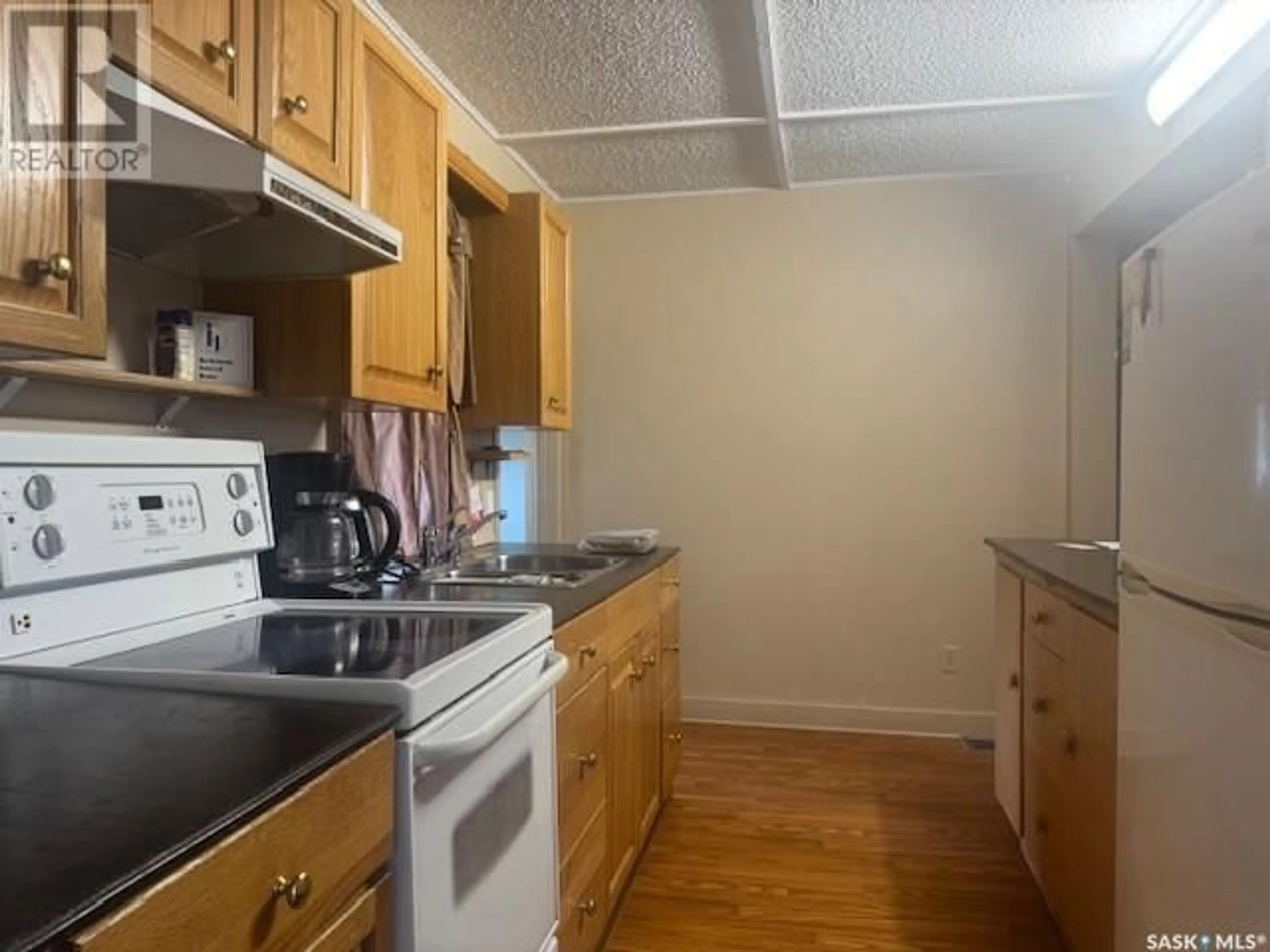 Standard kitchen, wood/laminate floor for 109 3RD AVENUE, Maymont Saskatchewan S0M1T0