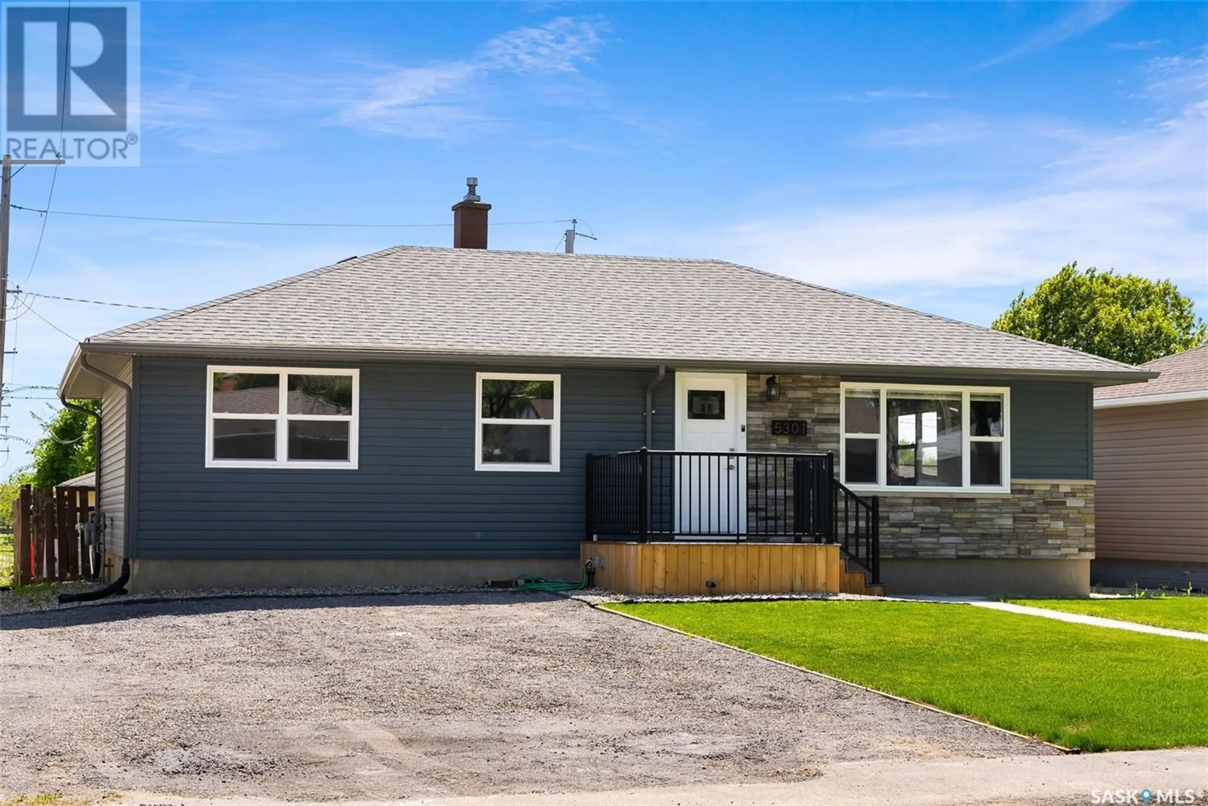 Home with vinyl exterior material, street for 5301 3RD AVENUE, Regina Saskatchewan S4T0G3