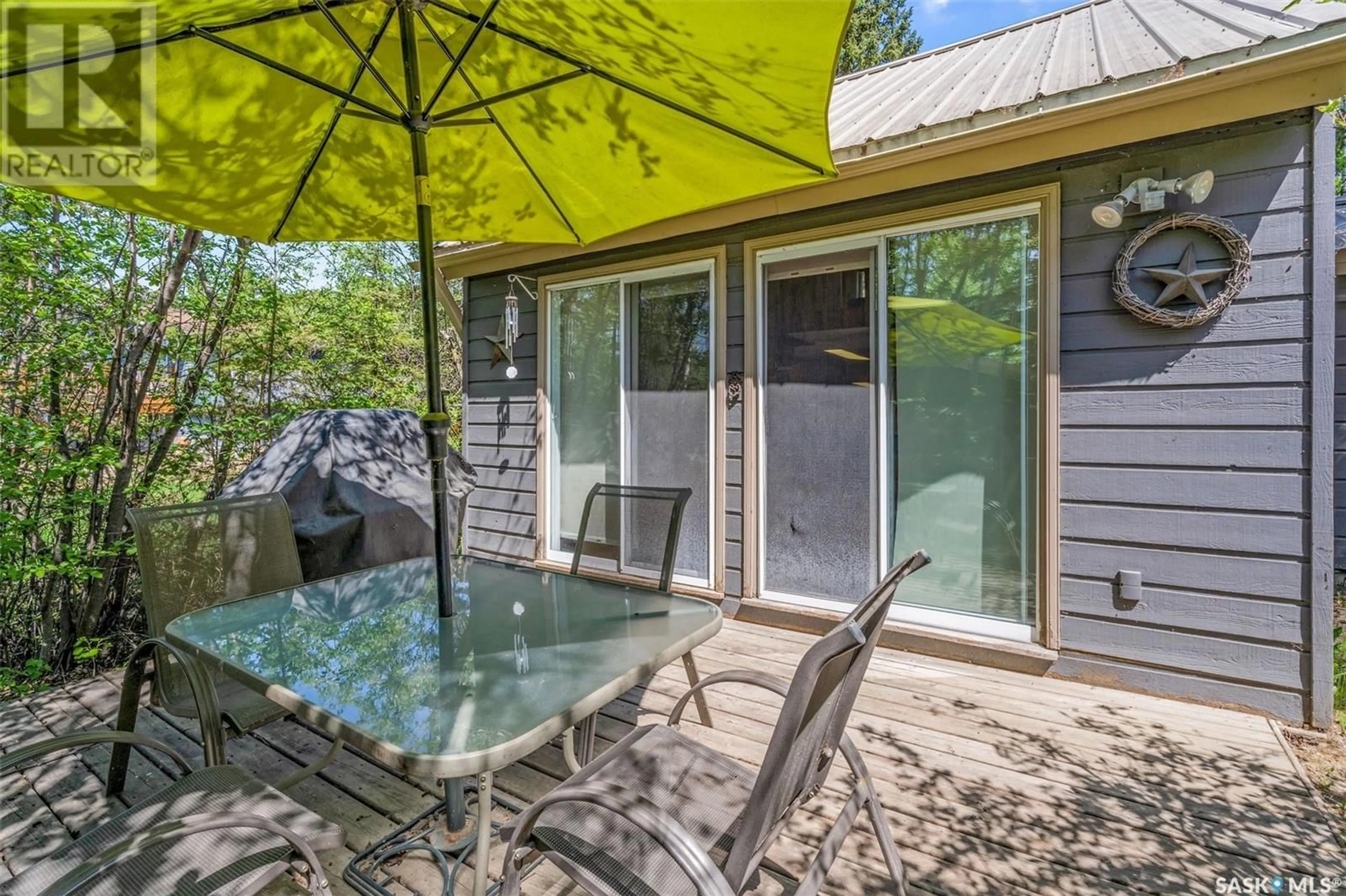 Patio, water/lake/river/ocean view for 221 JACOBSON DRIVE, Christopher Lake Saskatchewan S0J0N0