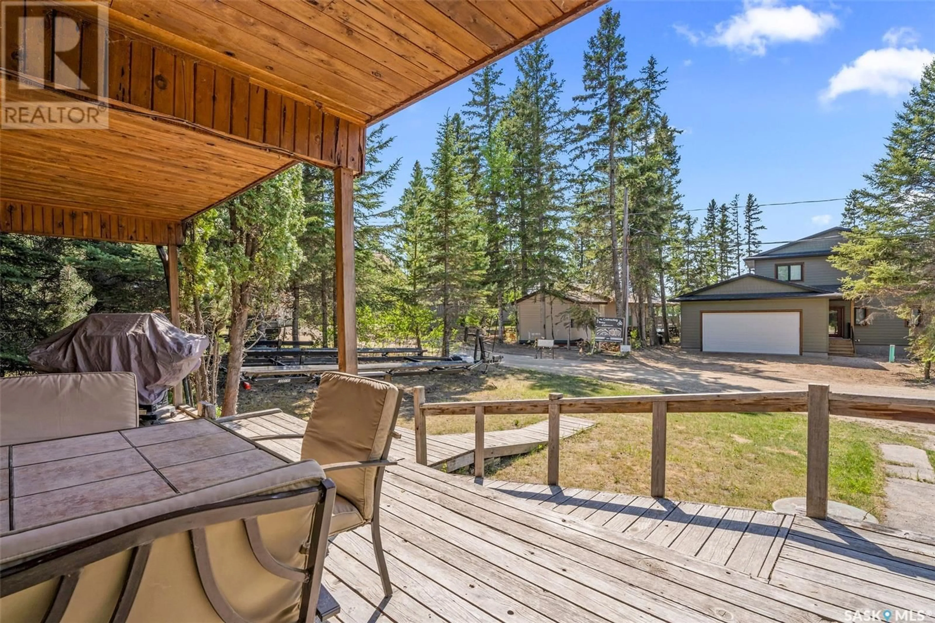 Patio, forest/trees view for 219 JACOBSON DRIVE, Christopher Lake Saskatchewan S0J0N0