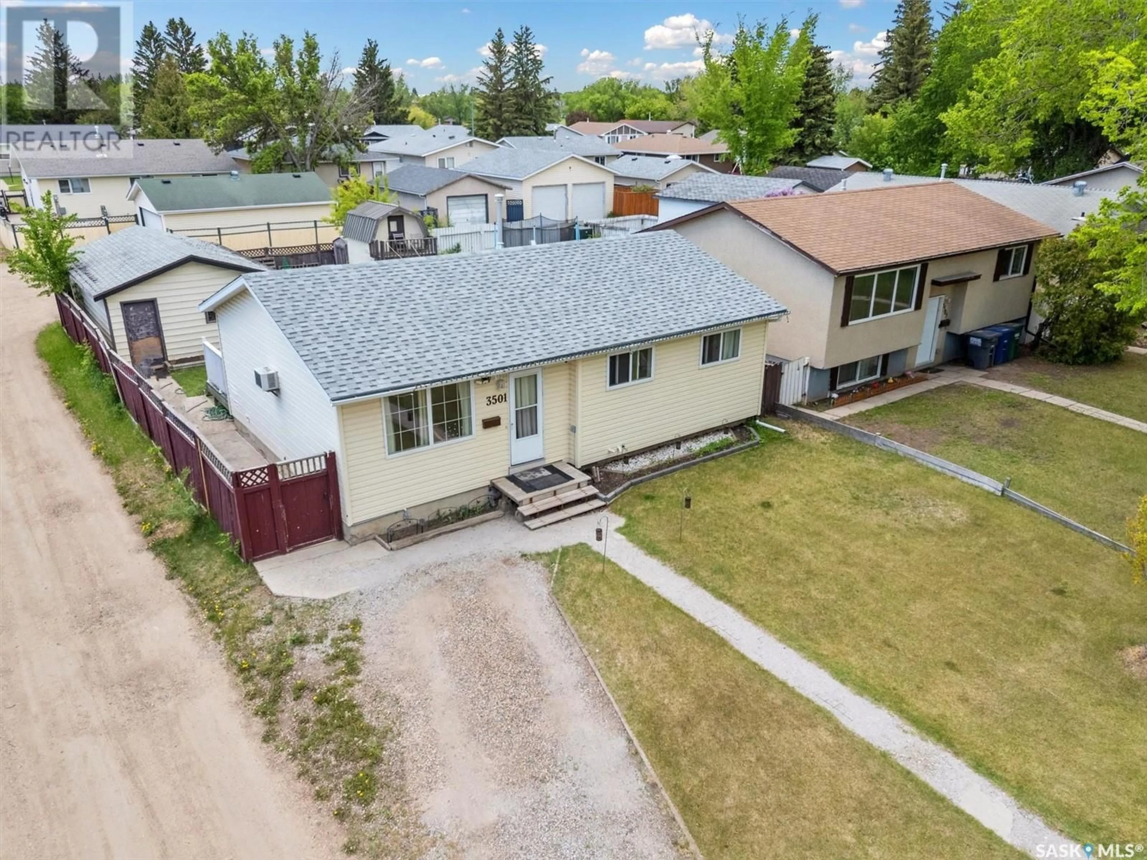A pic from outside/outdoor area/front of a property/back of a property/a pic from drone, street for 3501 MIYO-WÂHKÔHTOWIN ROAD, Saskatoon Saskatchewan S7L4R9