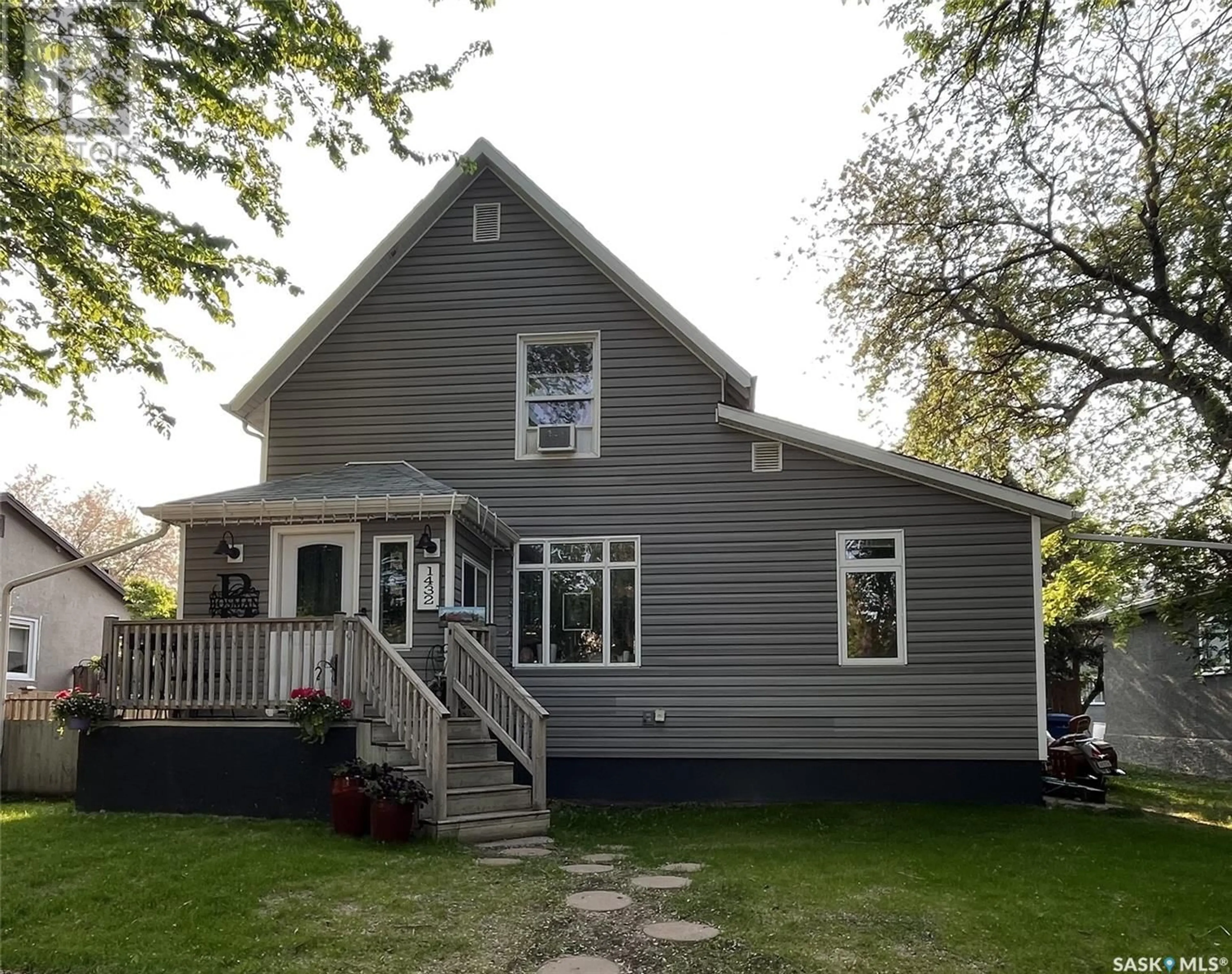 Home with vinyl exterior material, street for 1432 103RD STREET, North Battleford Saskatchewan S9A1L3