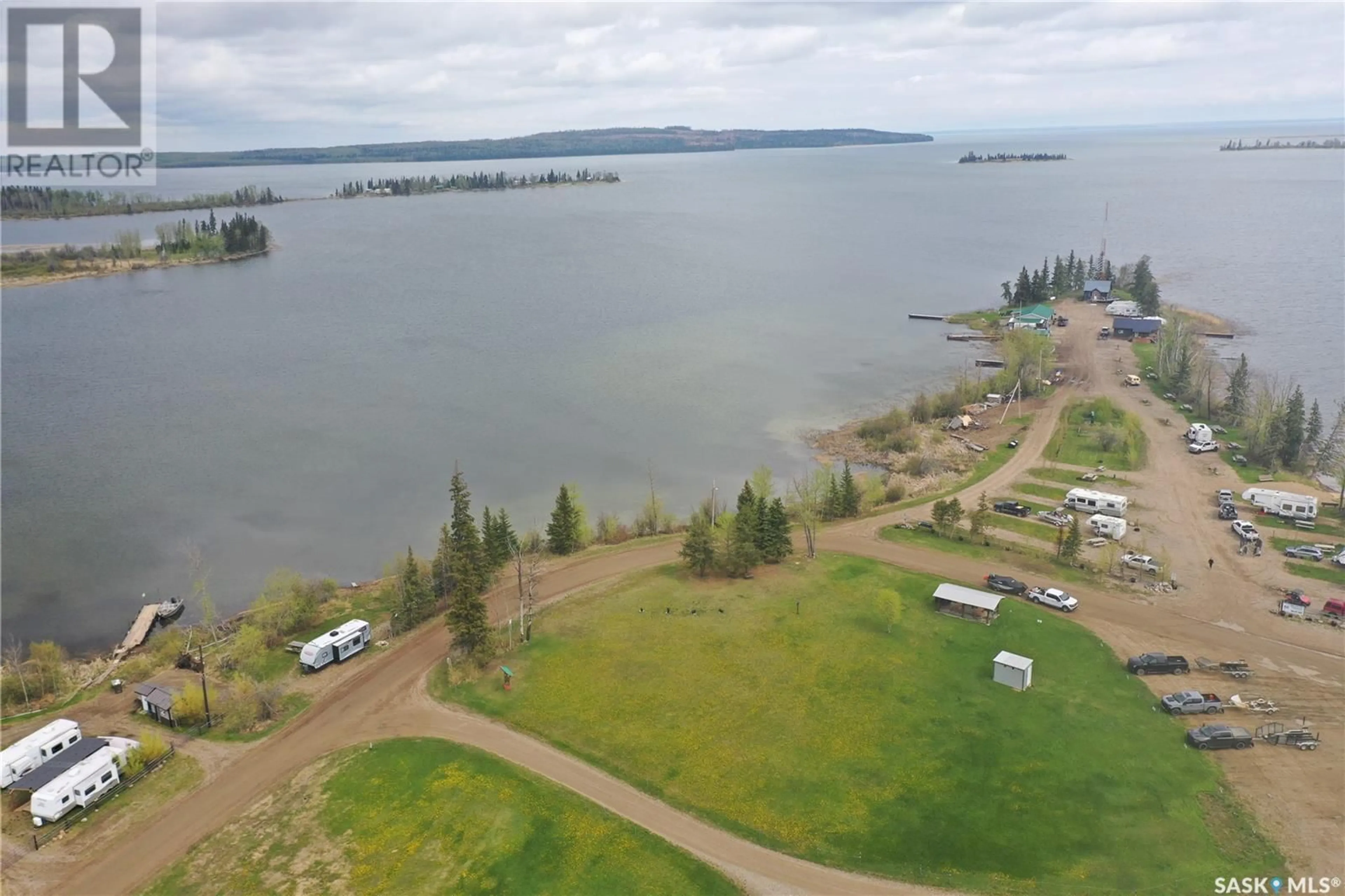 A pic from outside/outdoor area/front of a property/back of a property/a pic from drone, water/lake/river/ocean view for DORE ROAD, Dore Lake Saskatchewan S0M1B0