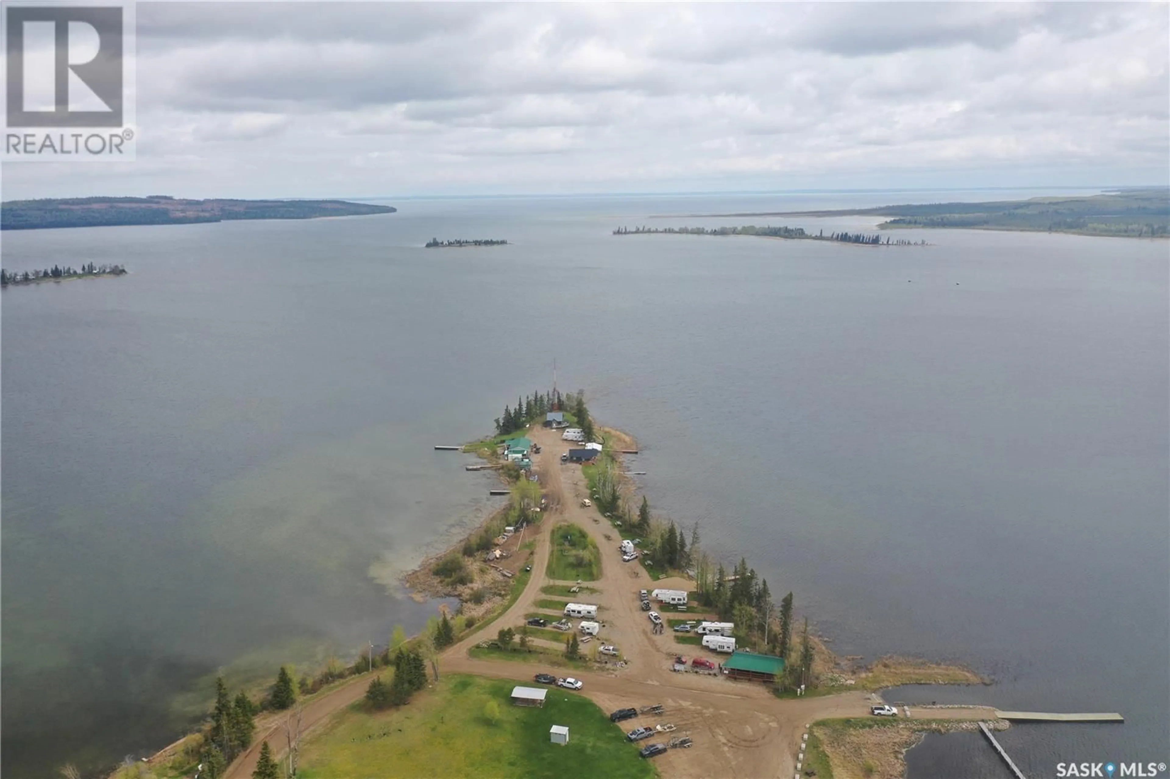 A pic from outside/outdoor area/front of a property/back of a property/a pic from drone, water/lake/river/ocean view for DORE ROAD, Dore Lake Saskatchewan S0M1B0