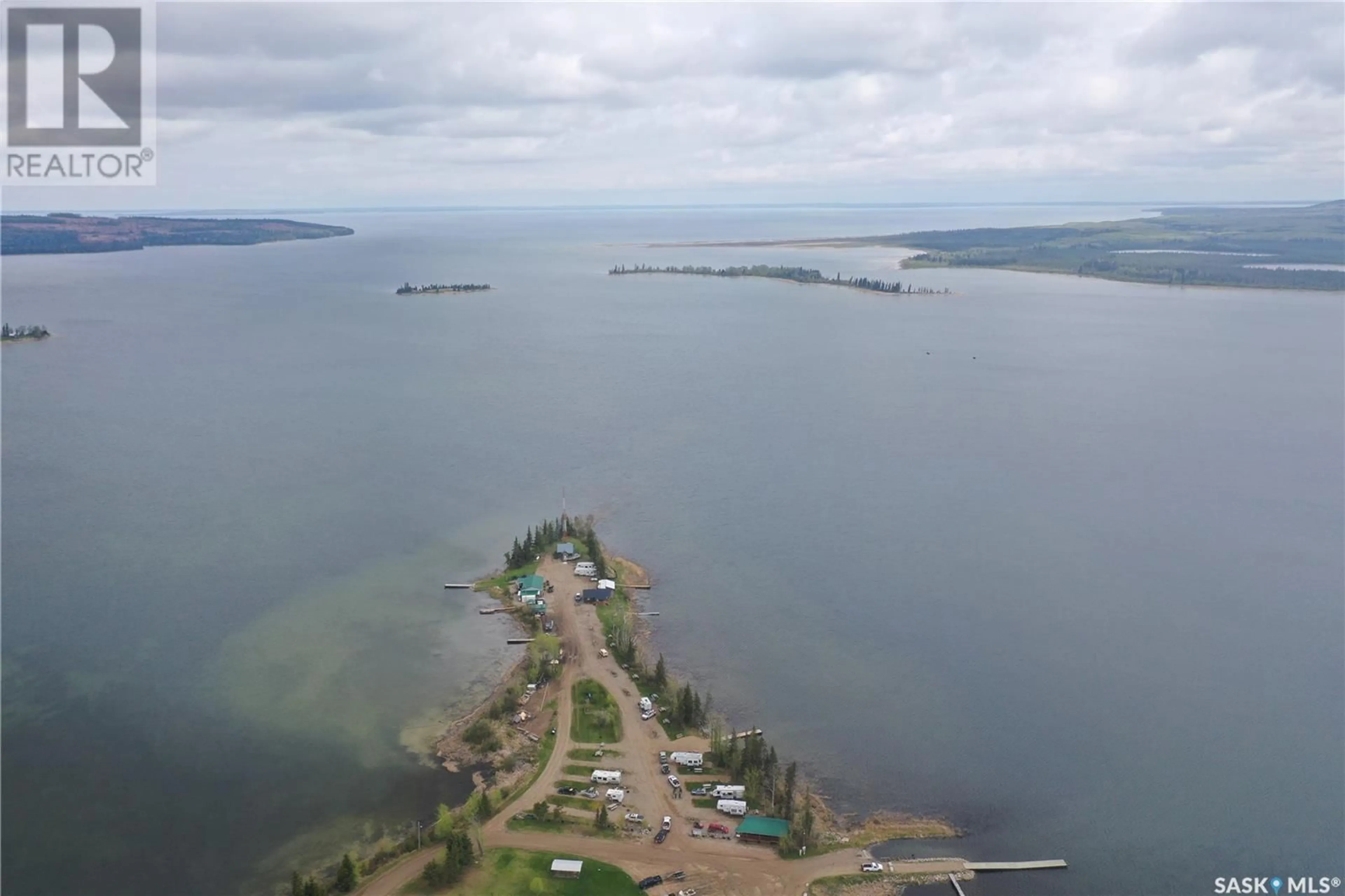 A pic from outside/outdoor area/front of a property/back of a property/a pic from drone, water/lake/river/ocean view for DORE ROAD, Dore Lake Saskatchewan S0M1B0