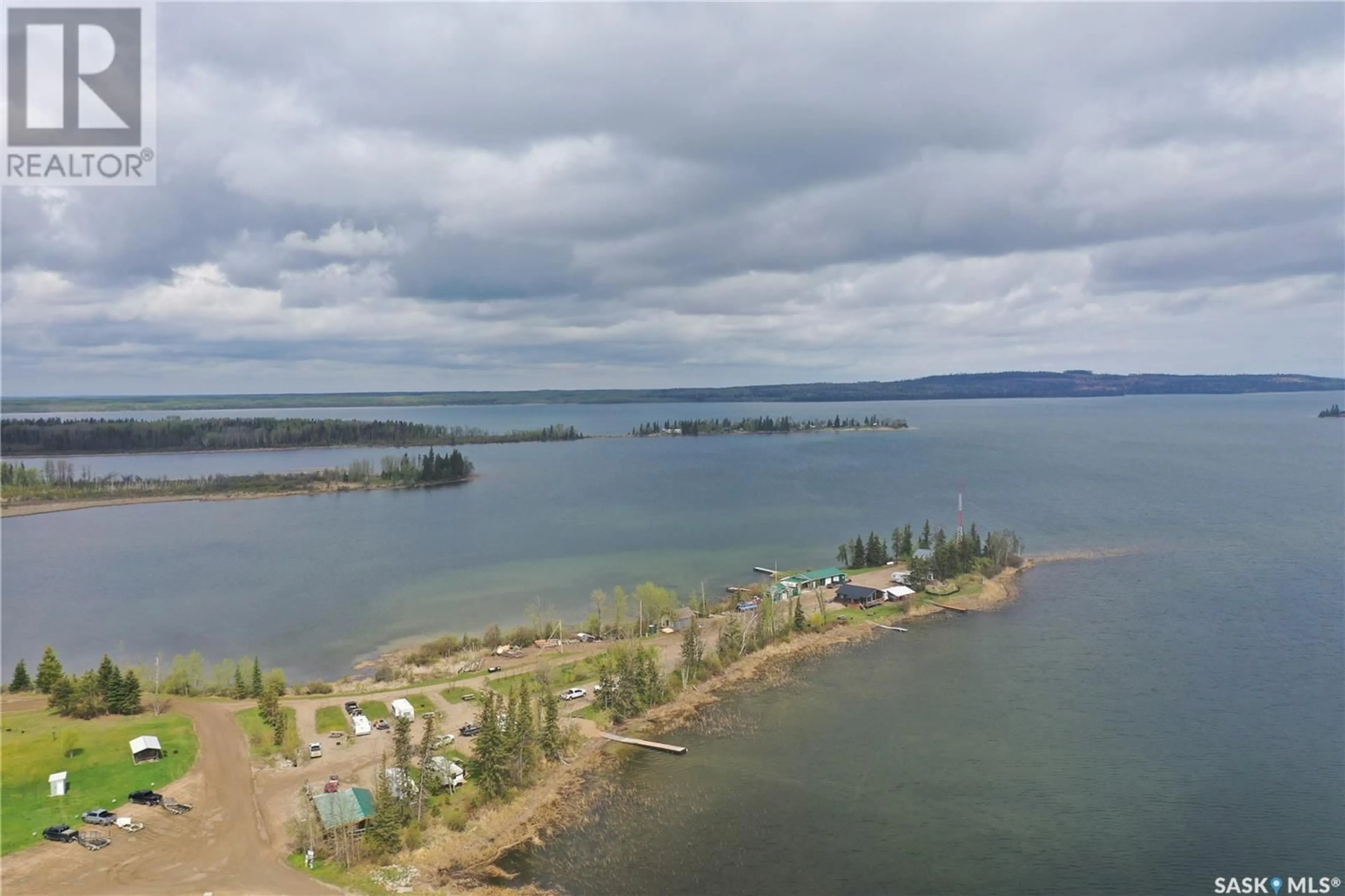 A pic from outside/outdoor area/front of a property/back of a property/a pic from drone, water/lake/river/ocean view for DORE ROAD, Dore Lake Saskatchewan S0M1B0