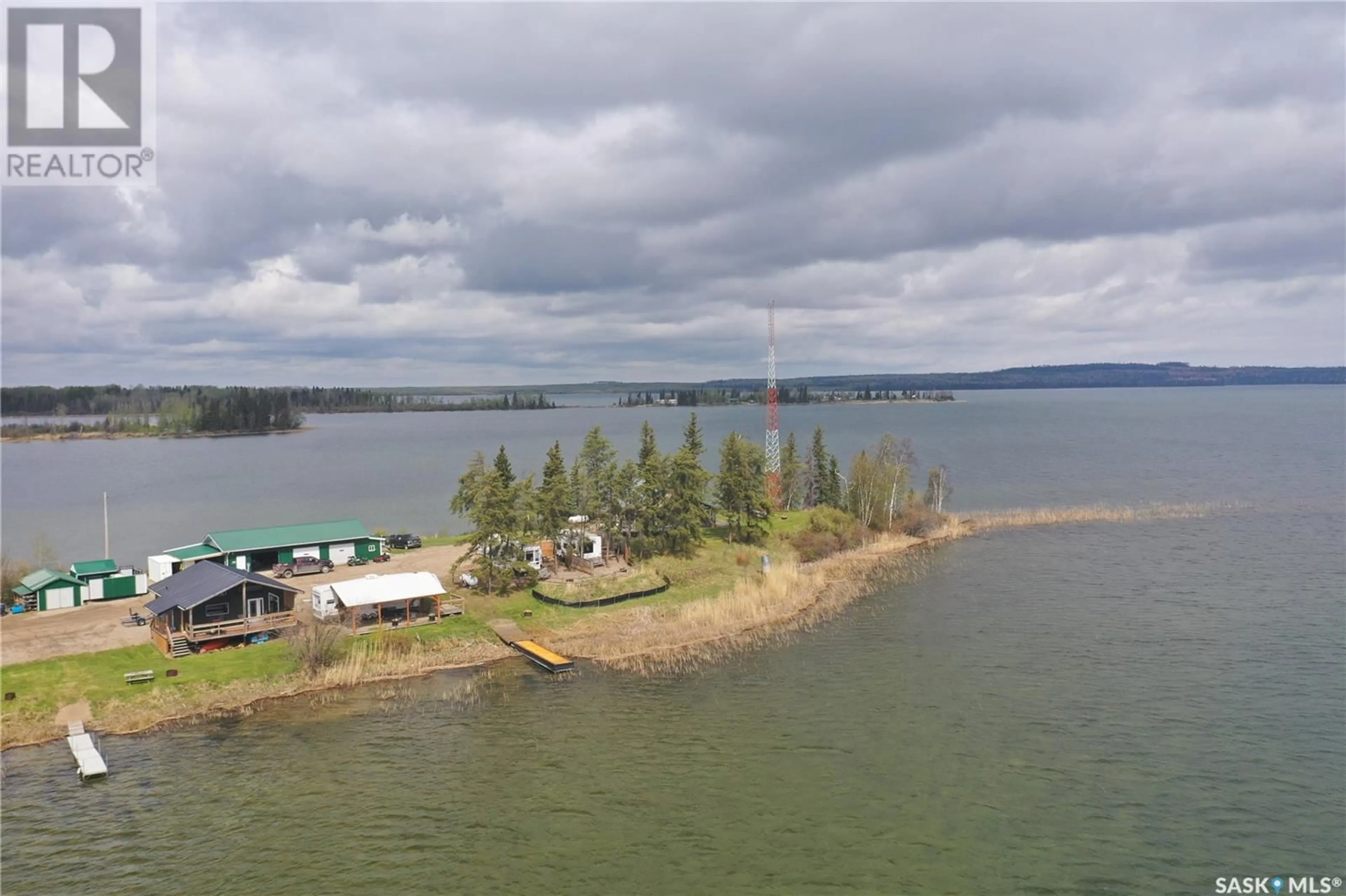 A pic from outside/outdoor area/front of a property/back of a property/a pic from drone, water/lake/river/ocean view for DORE ROAD, Dore Lake Saskatchewan S0M1B0