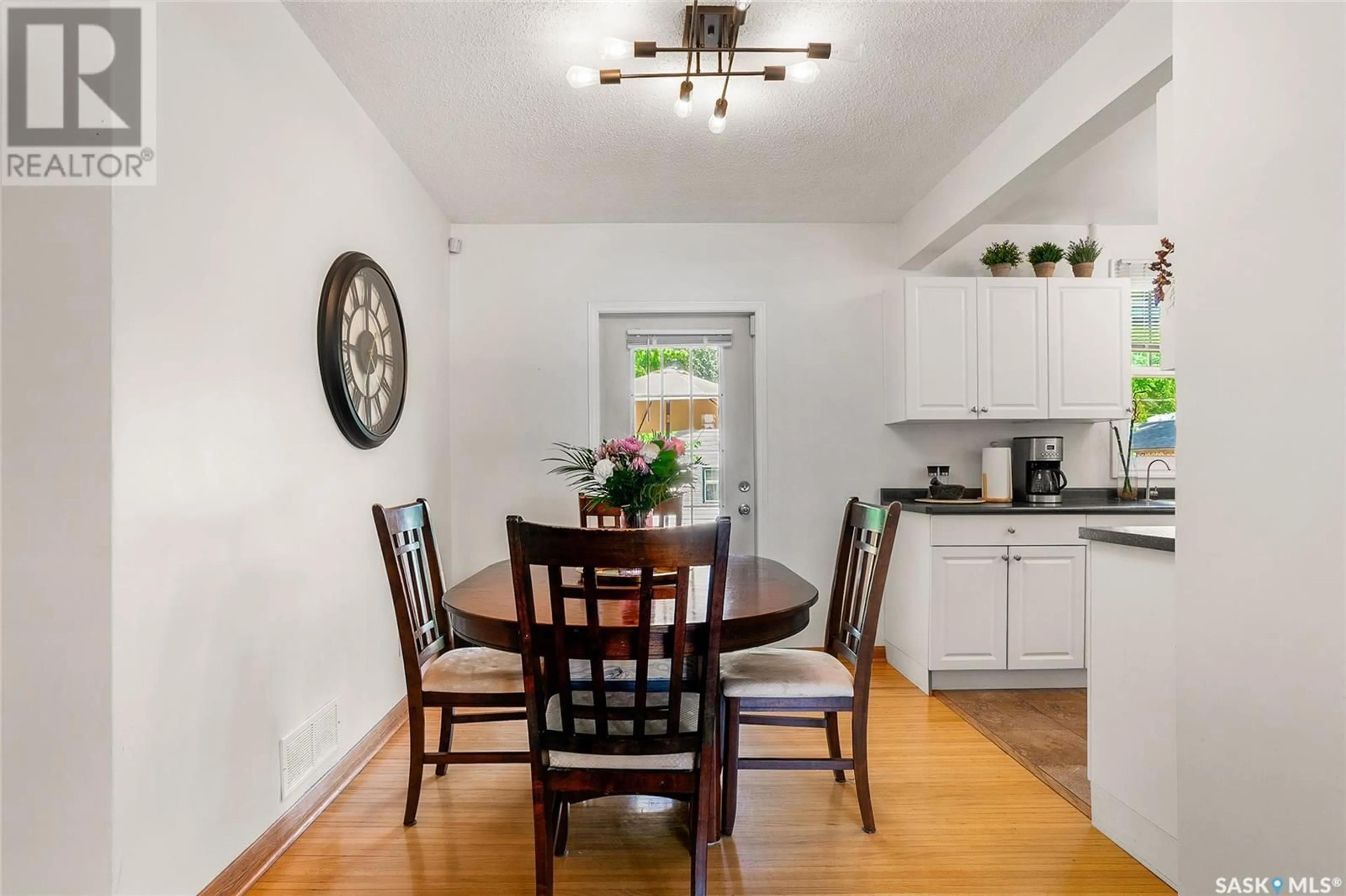 Dining room, wood/laminate floor for 1609 MUNROE AVENUE, Saskatoon Saskatchewan S7H2G7