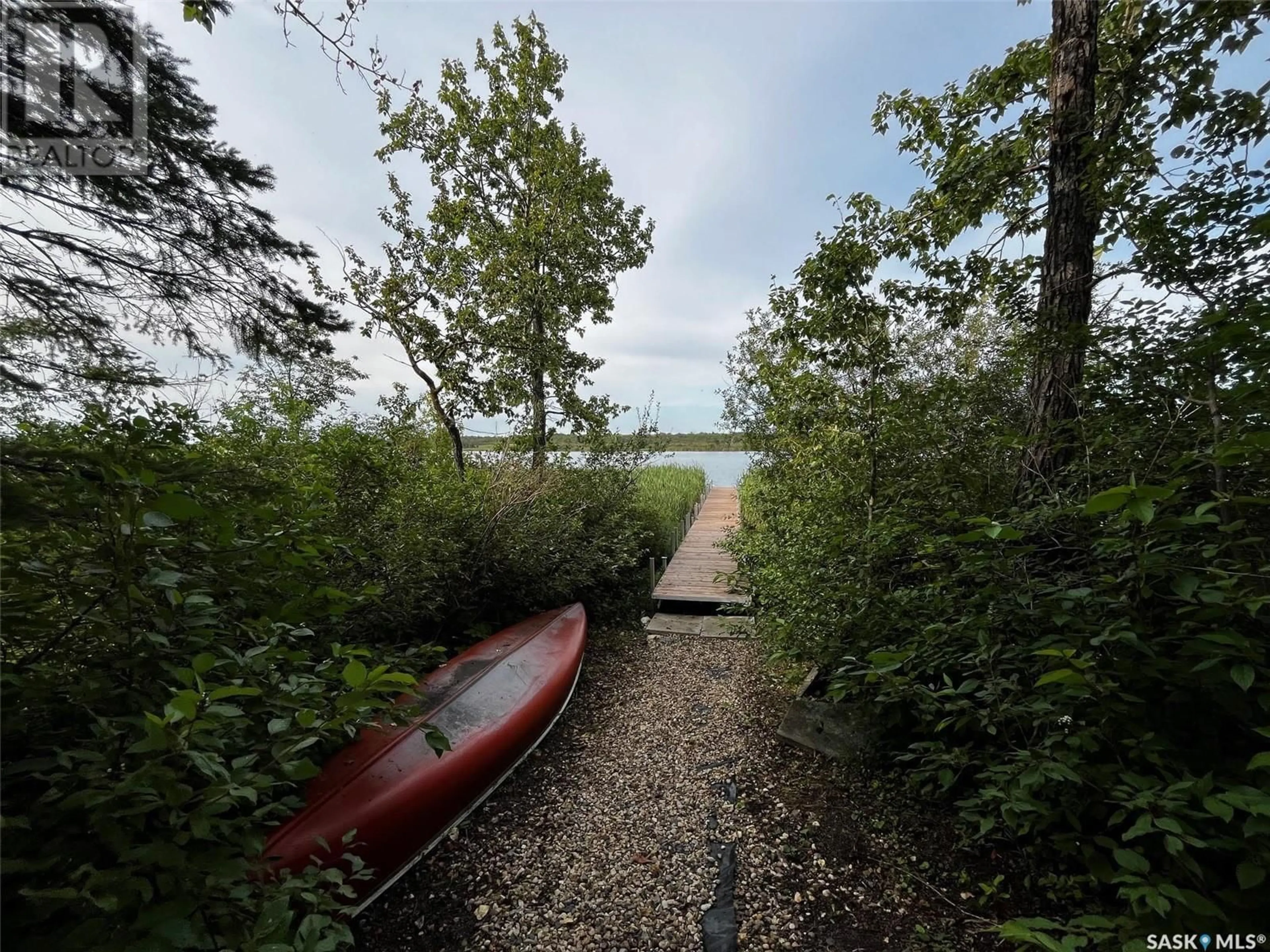 A pic from outside/outdoor area/front of a property/back of a property/a pic from drone, water/lake/river/ocean view for SCHITKA BEACH DRIVE, Wakaw Lake Saskatchewan S0K0A0