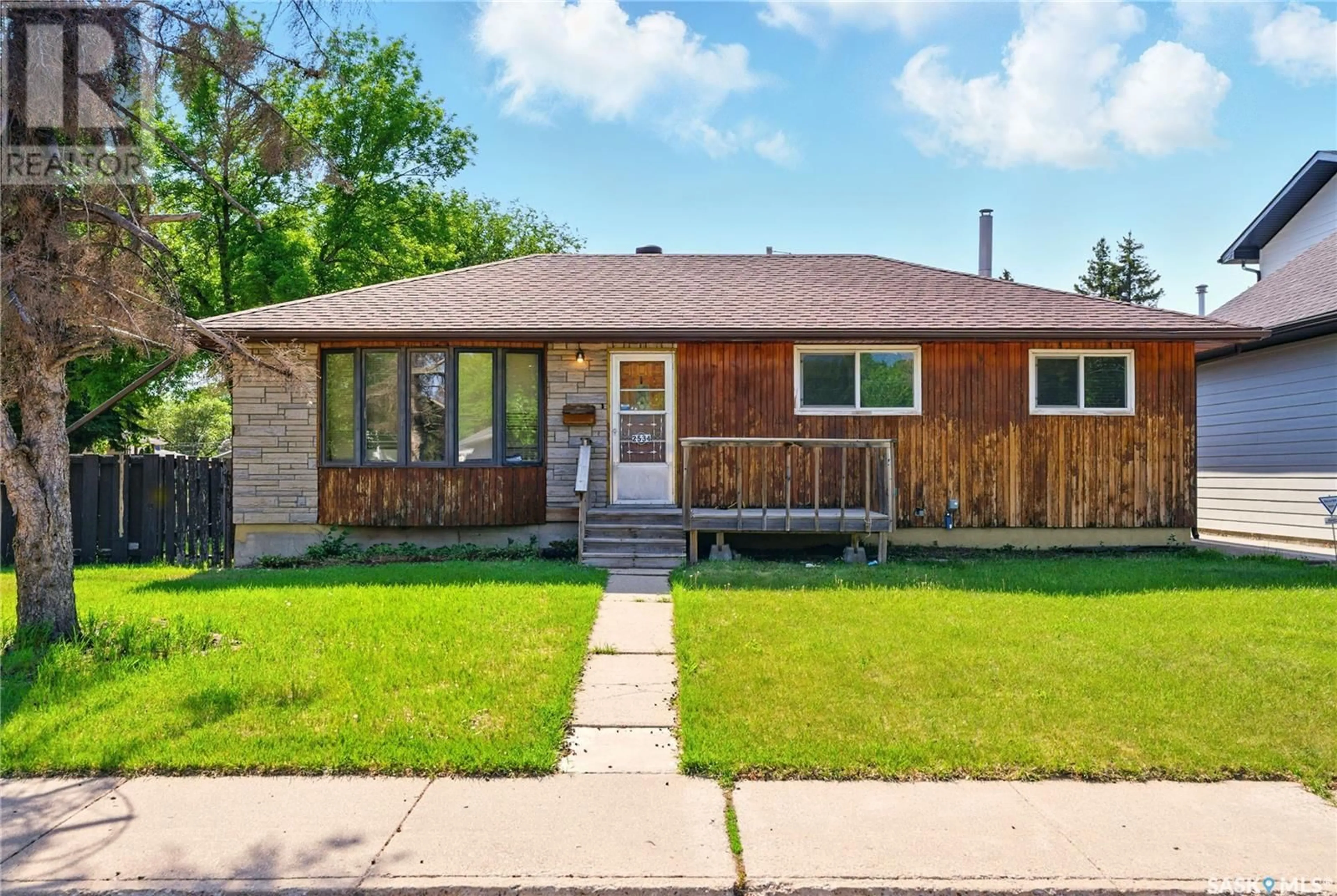 Home with brick exterior material, street for 2534 EWART AVENUE, Saskatoon Saskatchewan S7J1Y8