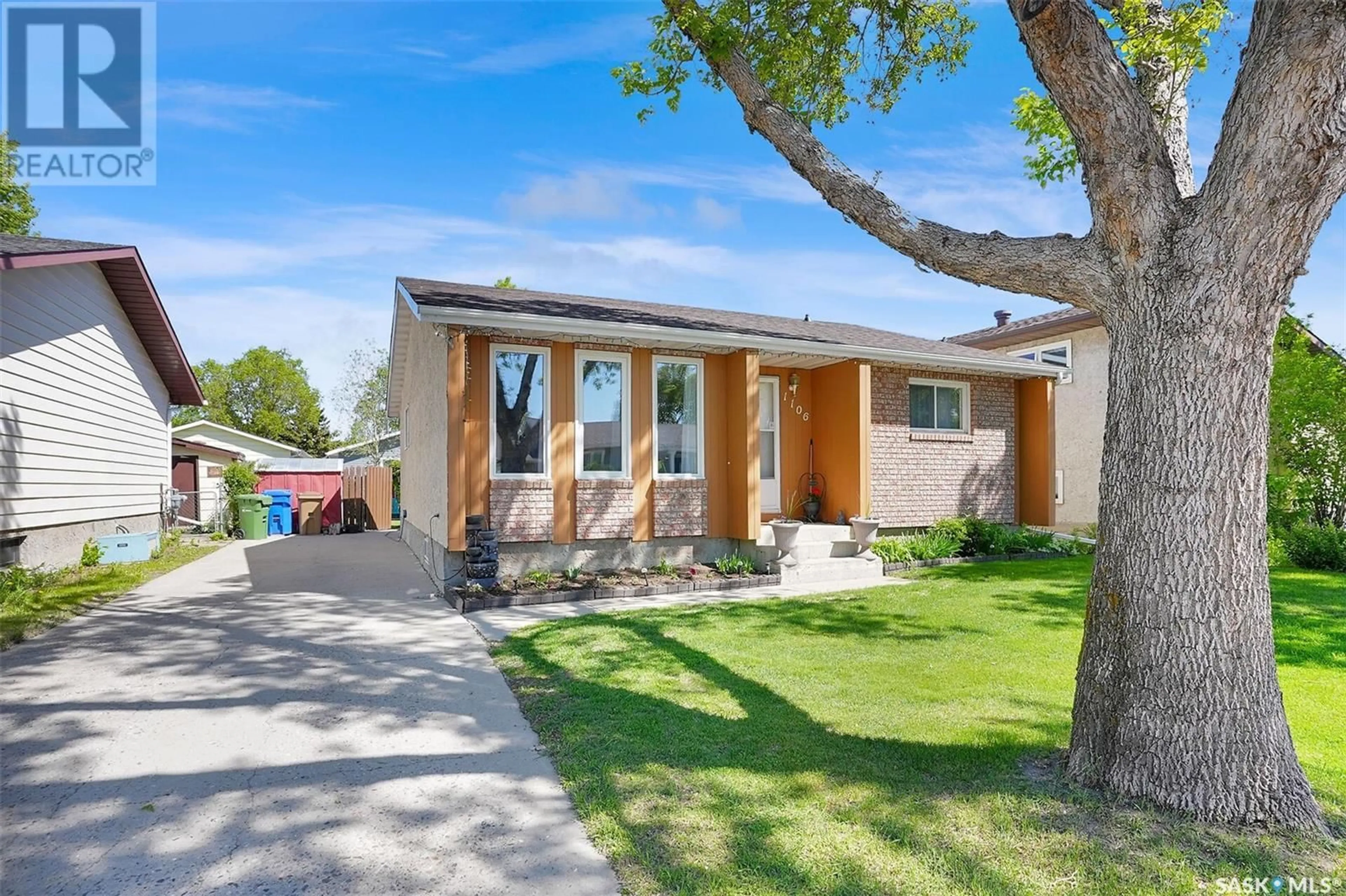 Home with brick exterior material, street for 1106 MCNEILL CRESCENT, Regina Saskatchewan S4R1A6