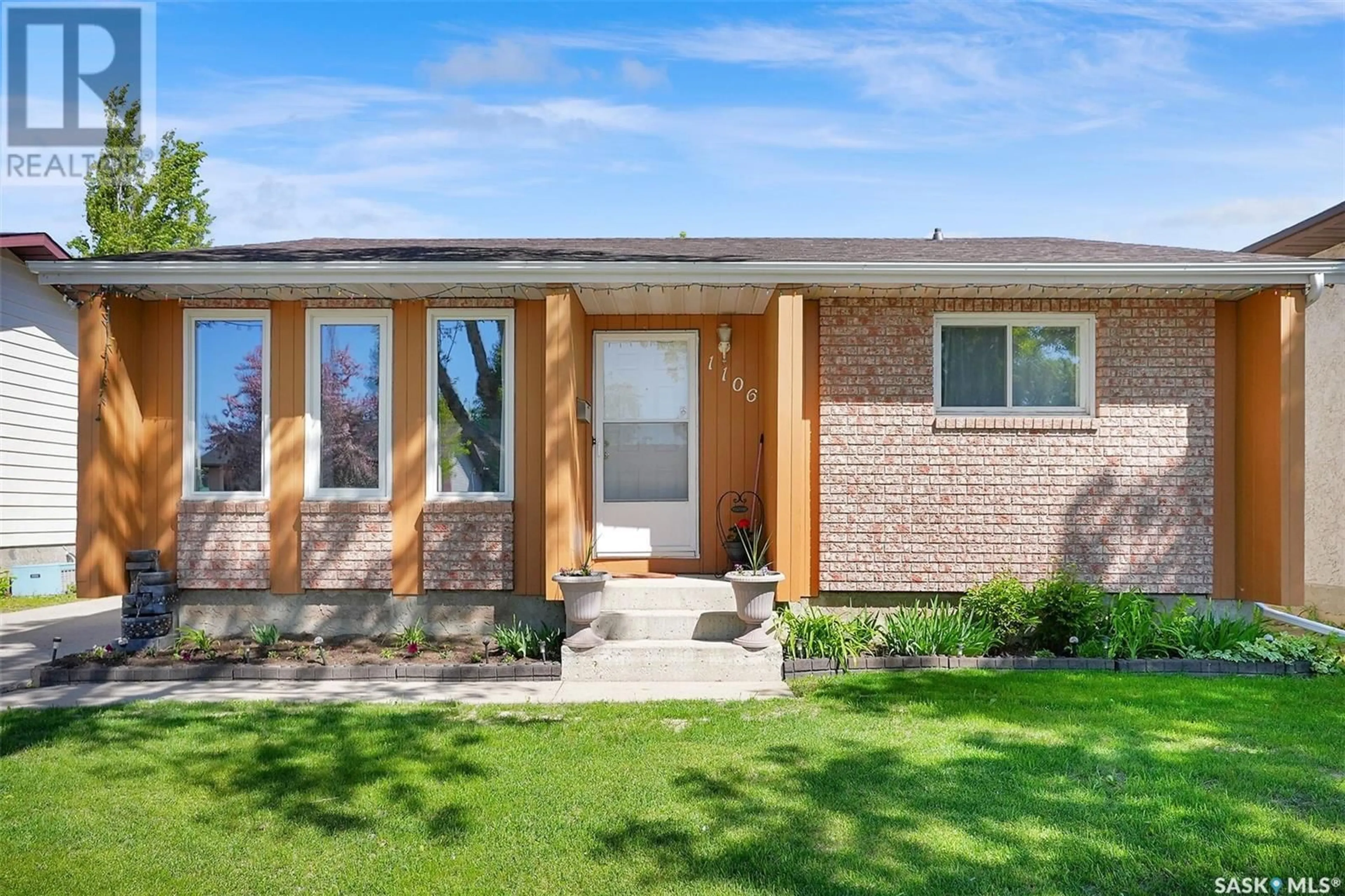 Home with brick exterior material, street for 1106 MCNEILL CRESCENT, Regina Saskatchewan S4R1A6