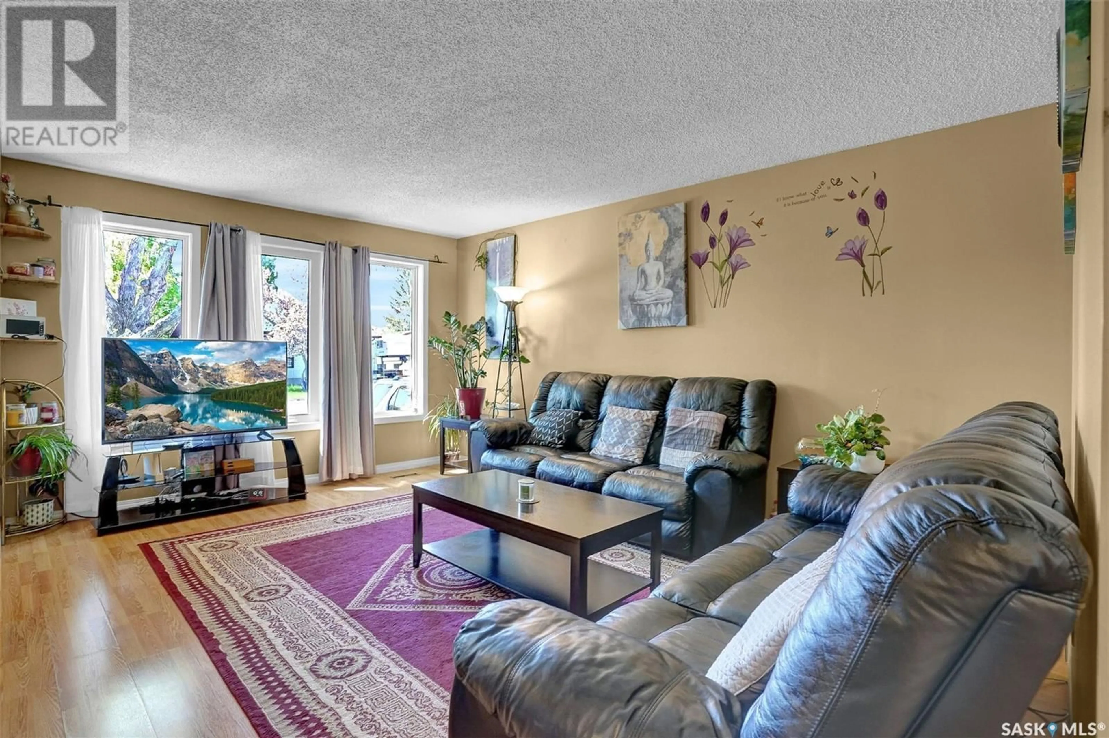 Living room with furniture, carpet floor for 1106 MCNEILL CRESCENT, Regina Saskatchewan S4R1A6