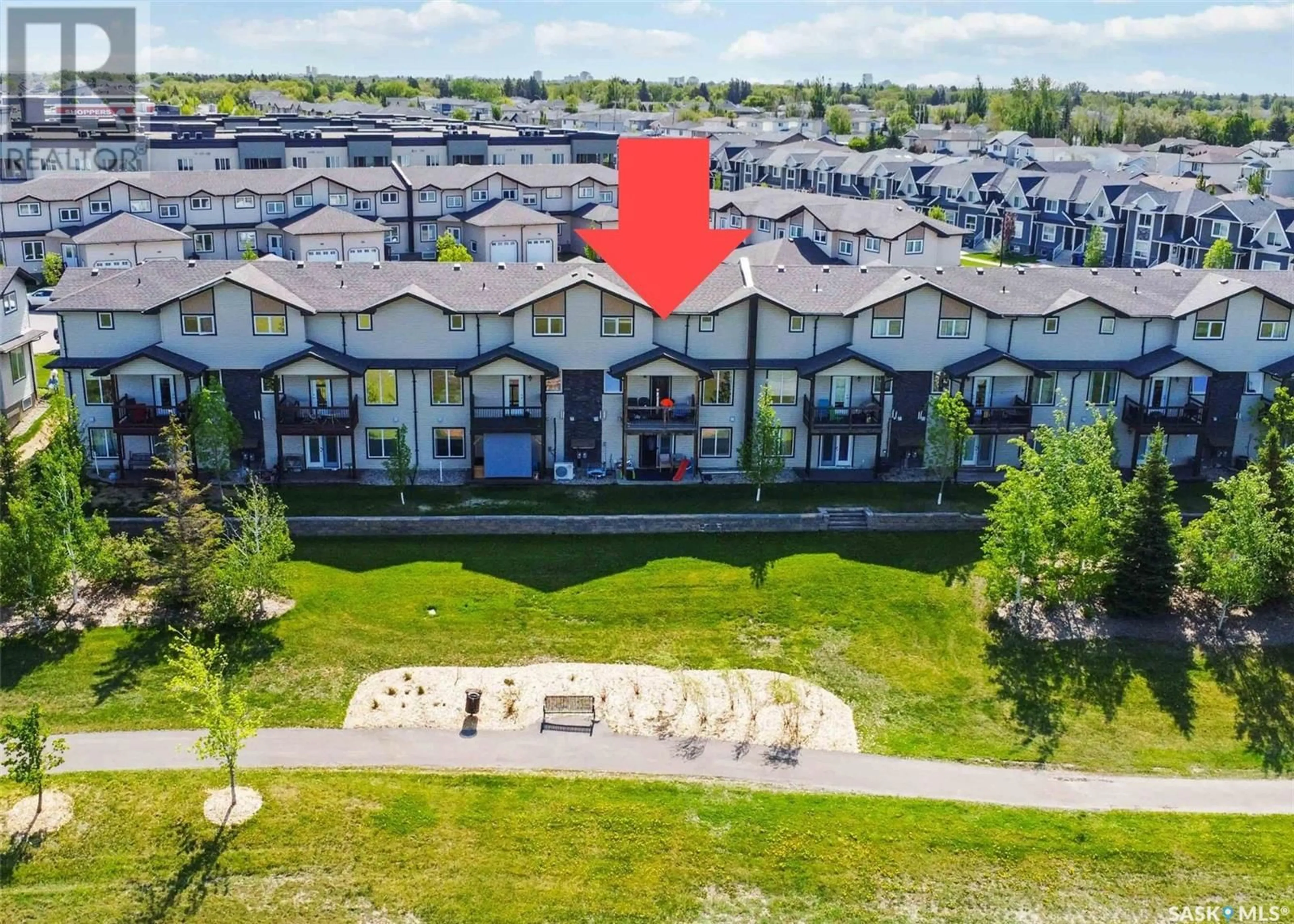 A pic from outside/outdoor area/front of a property/back of a property/a pic from drone, water/lake/river/ocean view for 118 - 10 HAMPTON CIRCLE, Saskatoon Saskatchewan S7R0C9