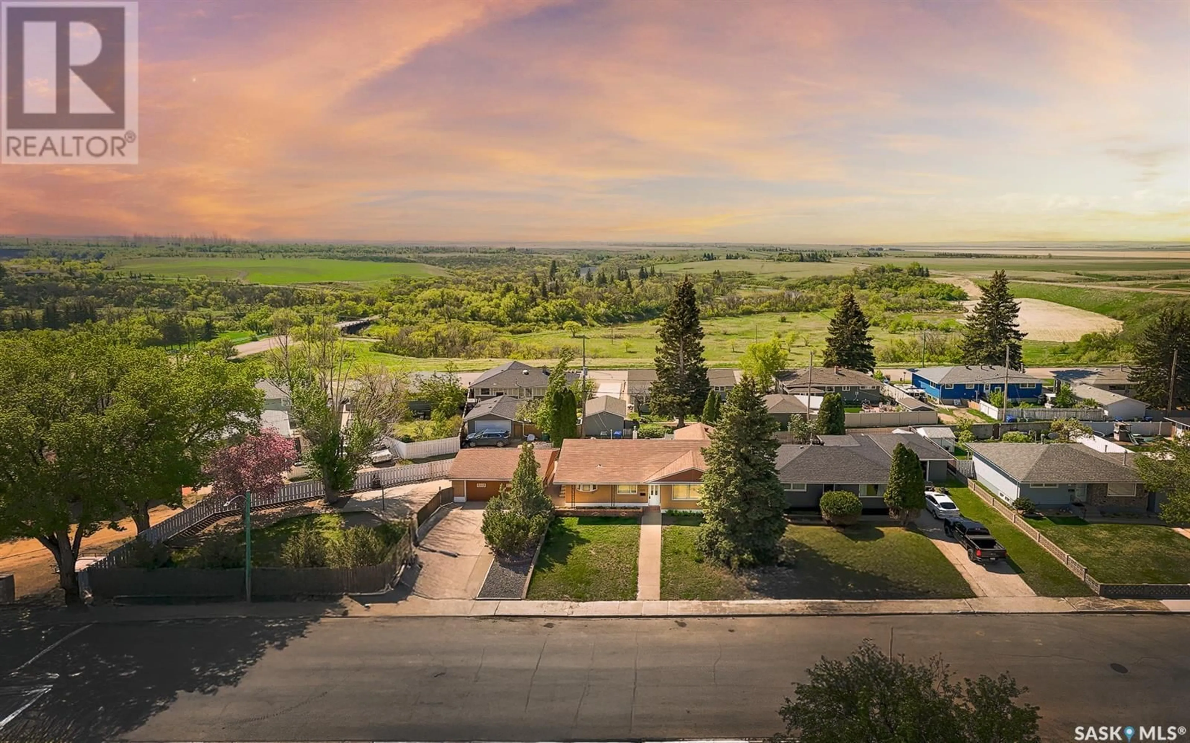A pic from outside/outdoor area/front of a property/back of a property/a pic from drone, mountain view for 801 KEITH STREET, Moose Jaw Saskatchewan S6H5R3