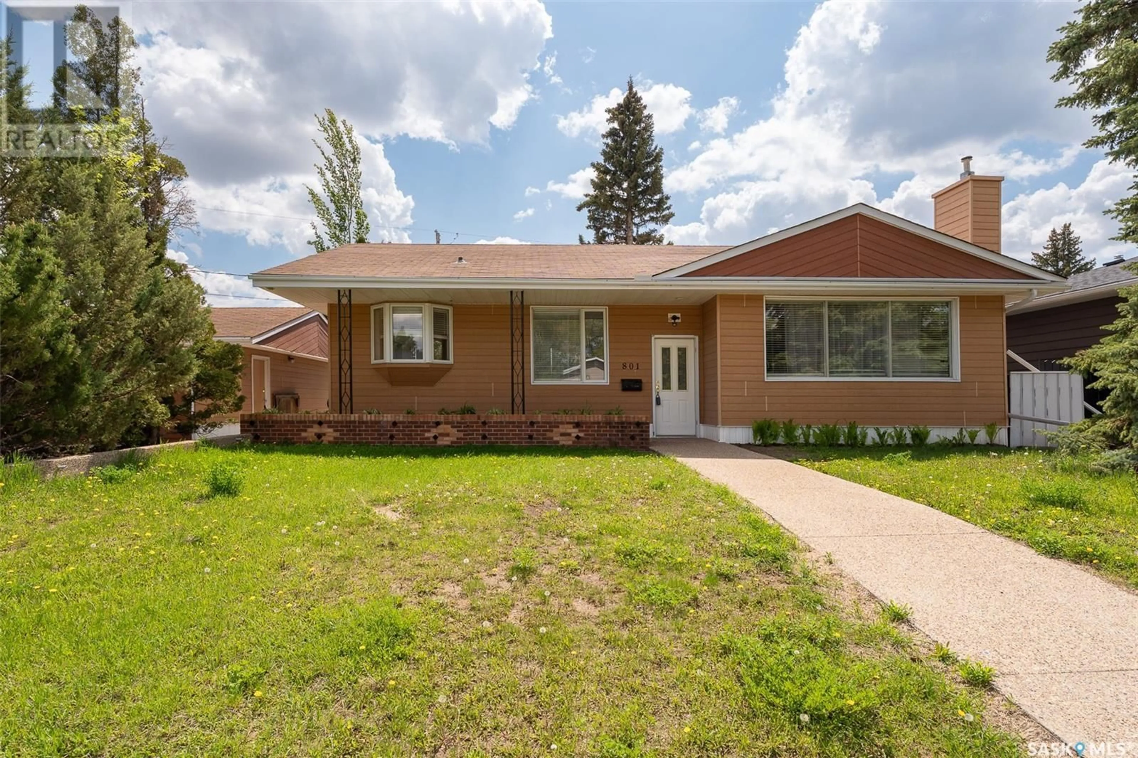 Home with brick exterior material, street for 801 KEITH STREET, Moose Jaw Saskatchewan S6H5R3