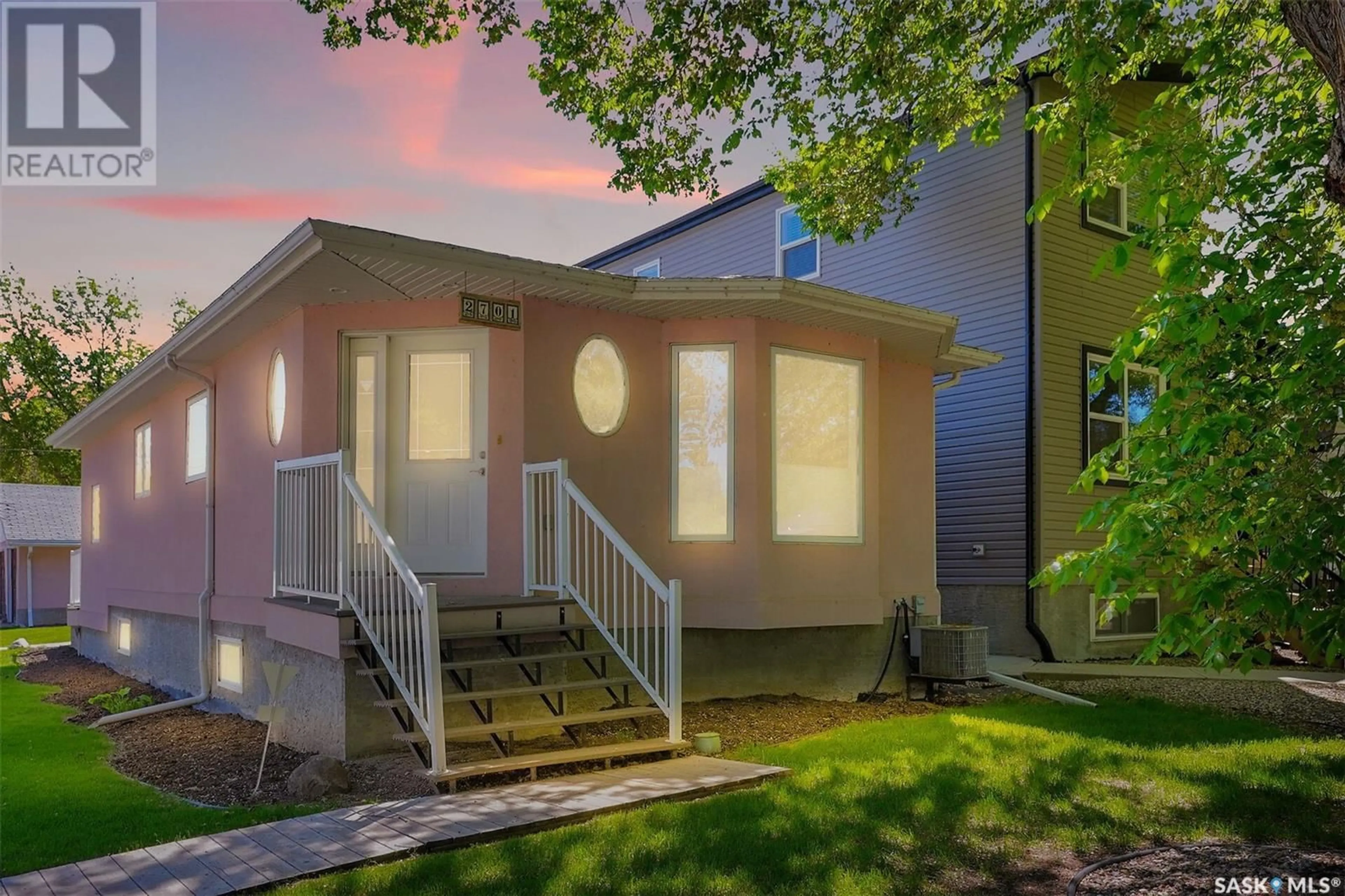 Home with vinyl exterior material, street for 2701 MCDONALD STREET, Regina Saskatchewan S4N2Z9
