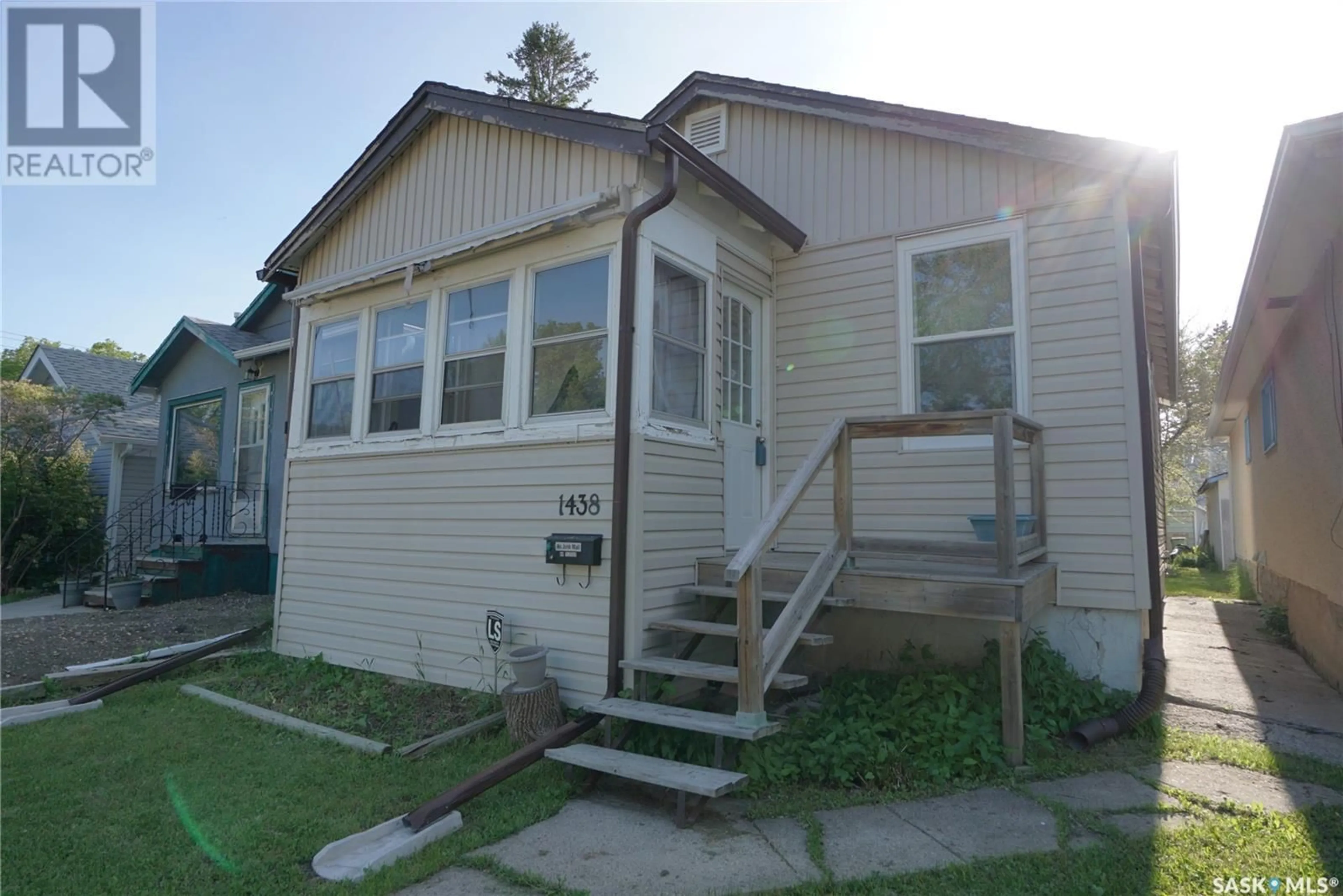 Home with vinyl exterior material, street for 1438 CONNAUGHT STREET, Regina Saskatchewan S4T4S9