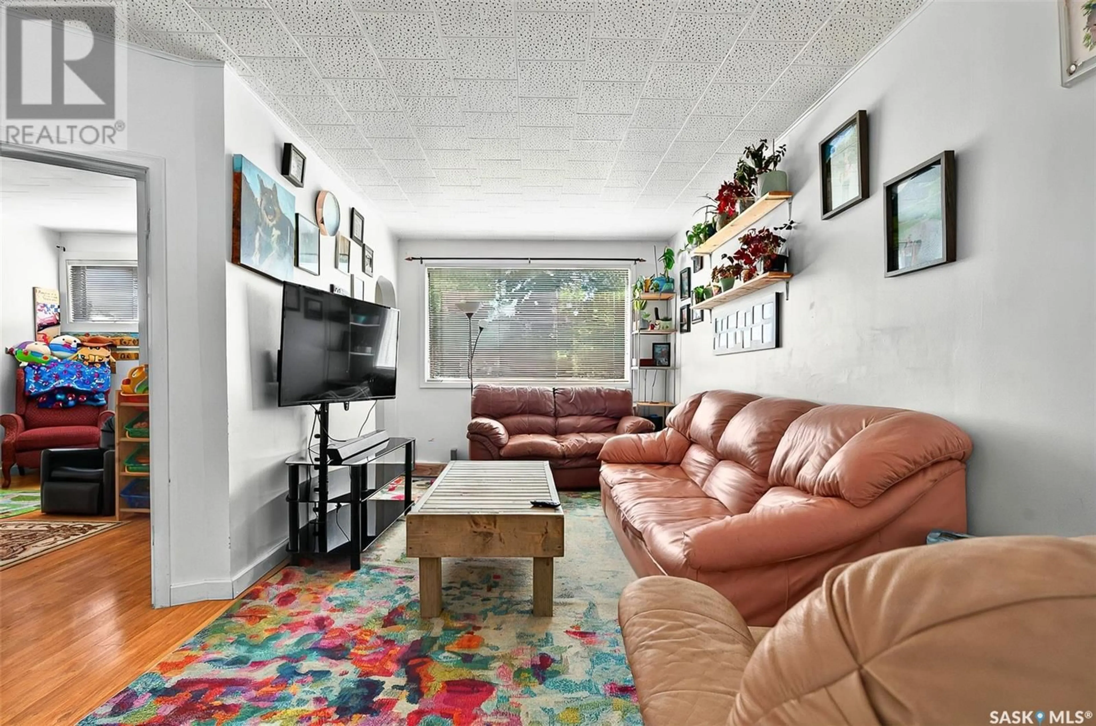 Living room with furniture, unknown for 926 LILLOOET STREET, Moose Jaw Saskatchewan S6H4Z8