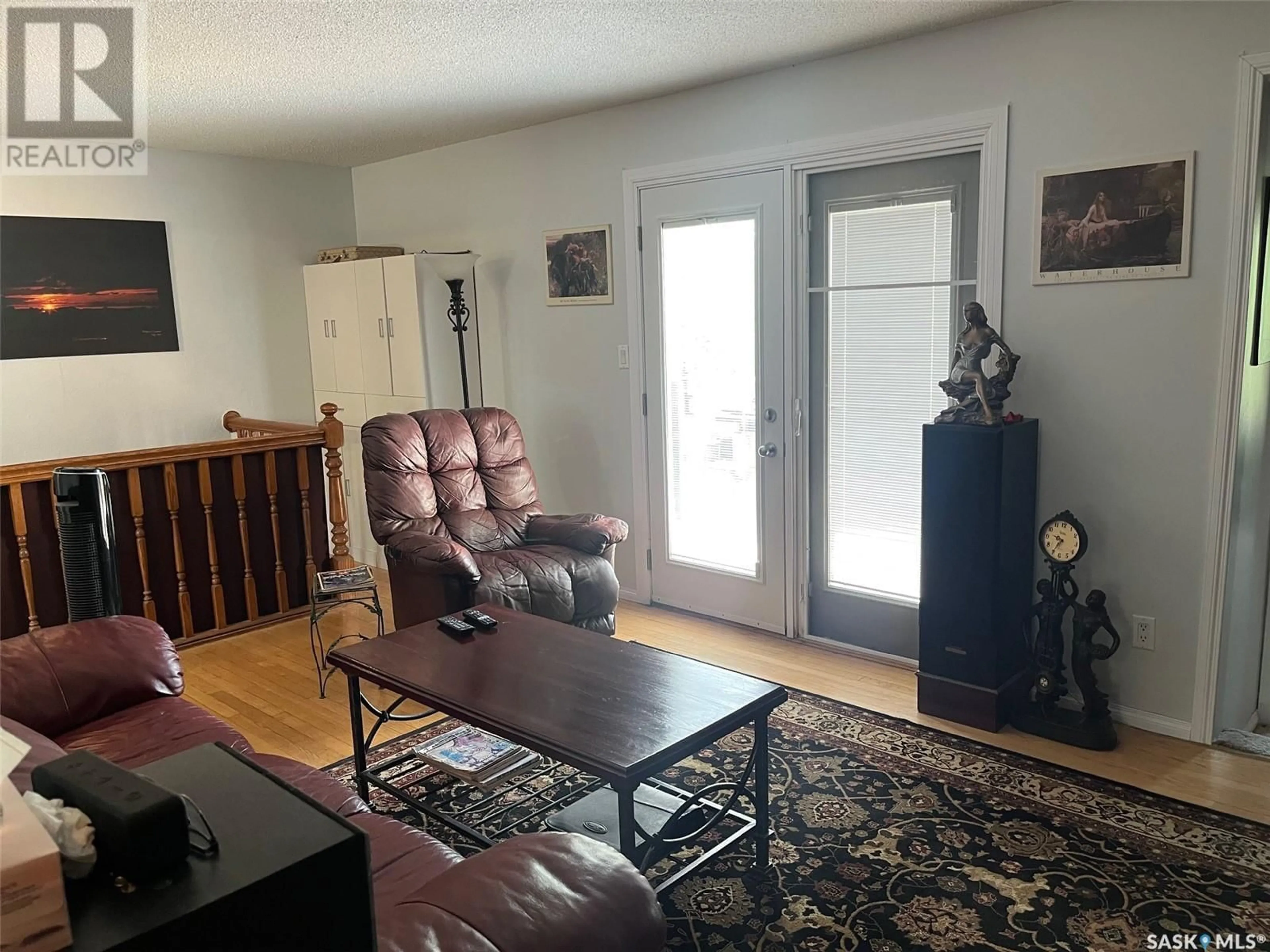 Living room with furniture, unknown for 1902 WESTVIEW PLACE, Estevan Saskatchewan S4A0J3