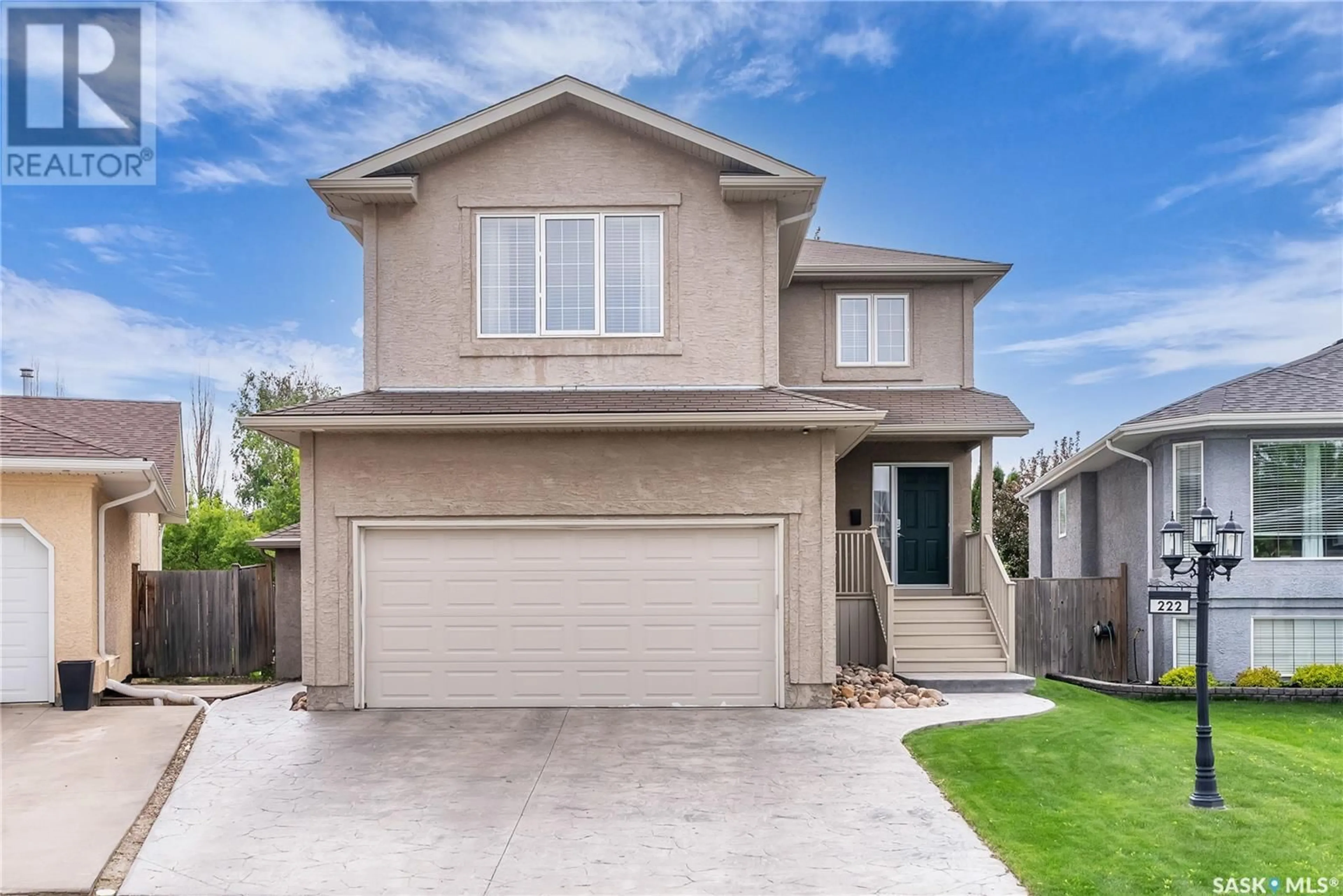 Home with vinyl exterior material, street for 222 PETERS COVE, Saskatoon Saskatchewan S7N4T5