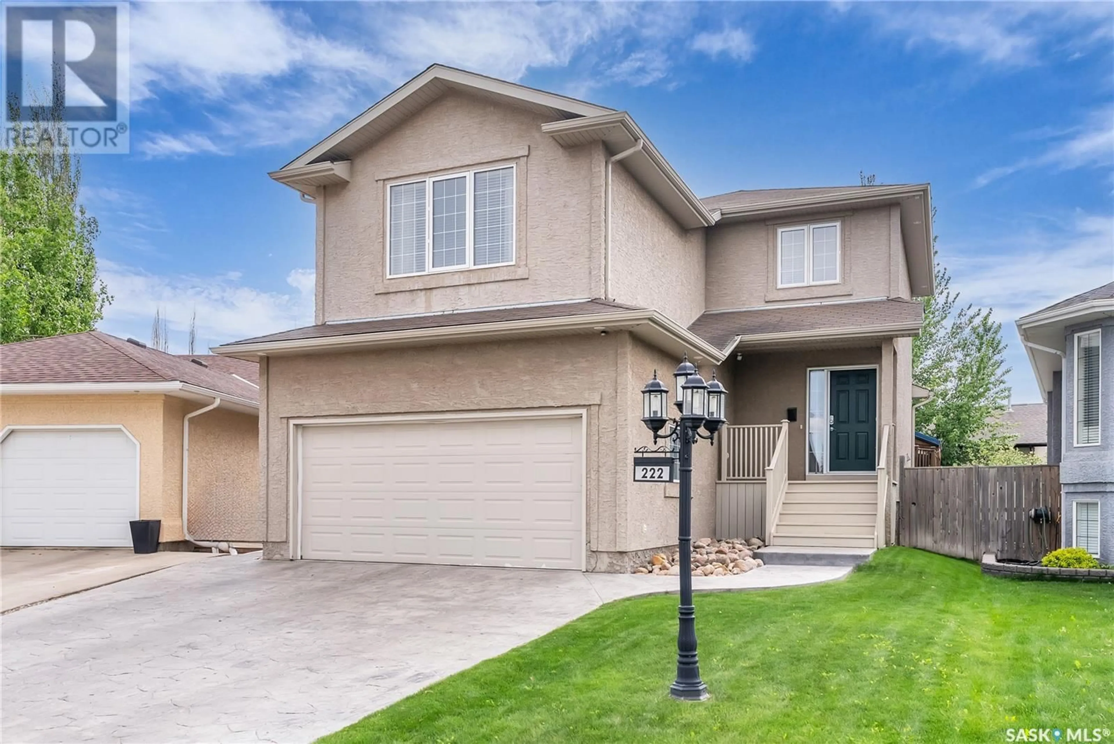 Home with vinyl exterior material, street for 222 PETERS COVE, Saskatoon Saskatchewan S7N4T5