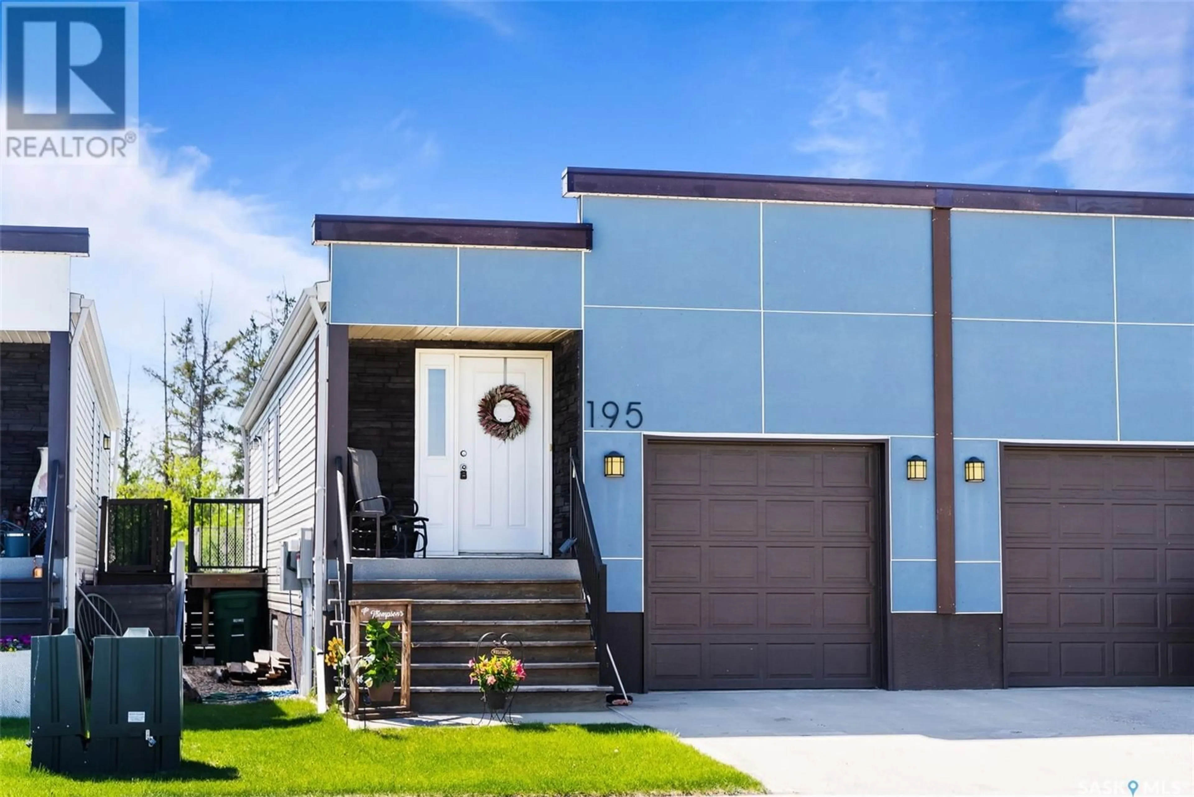 Home with vinyl exterior material, street for 195 CHATEAU CRESCENT, Pilot Butte Saskatchewan S0G3Z0