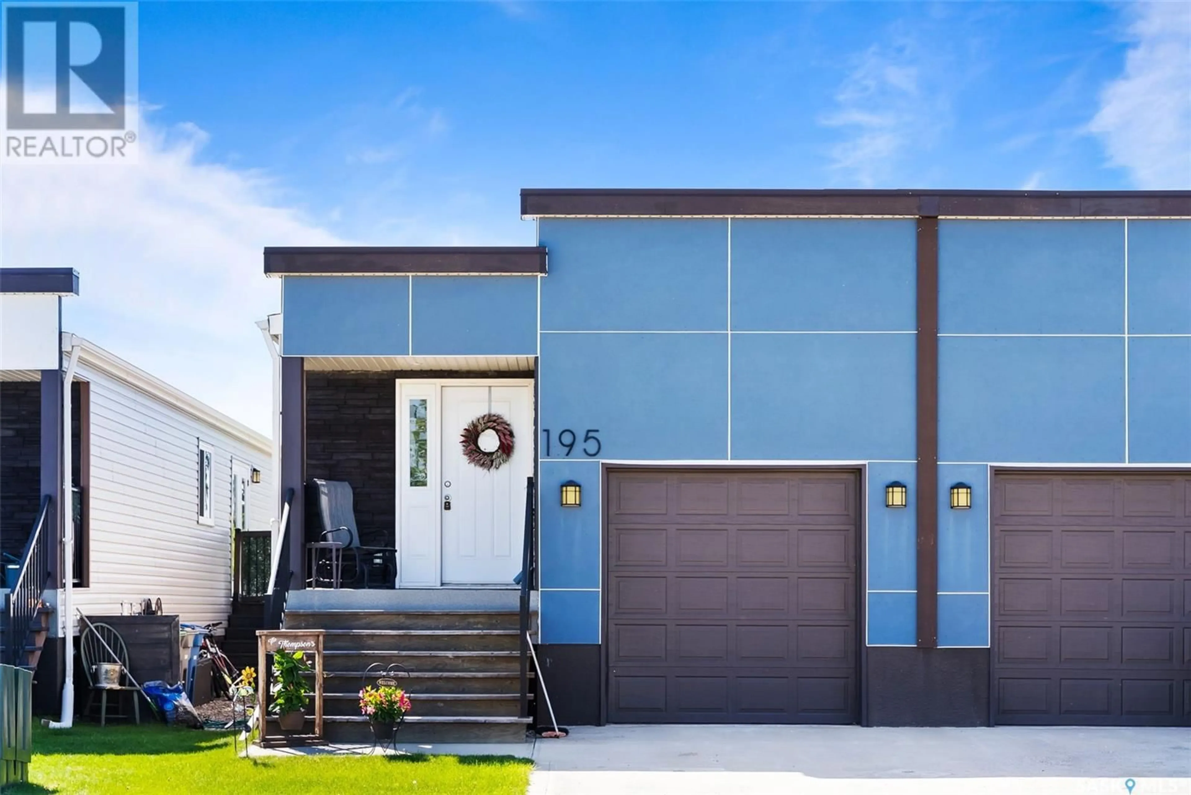 Home with vinyl exterior material, street for 195 CHATEAU CRESCENT, Pilot Butte Saskatchewan S0G3Z0
