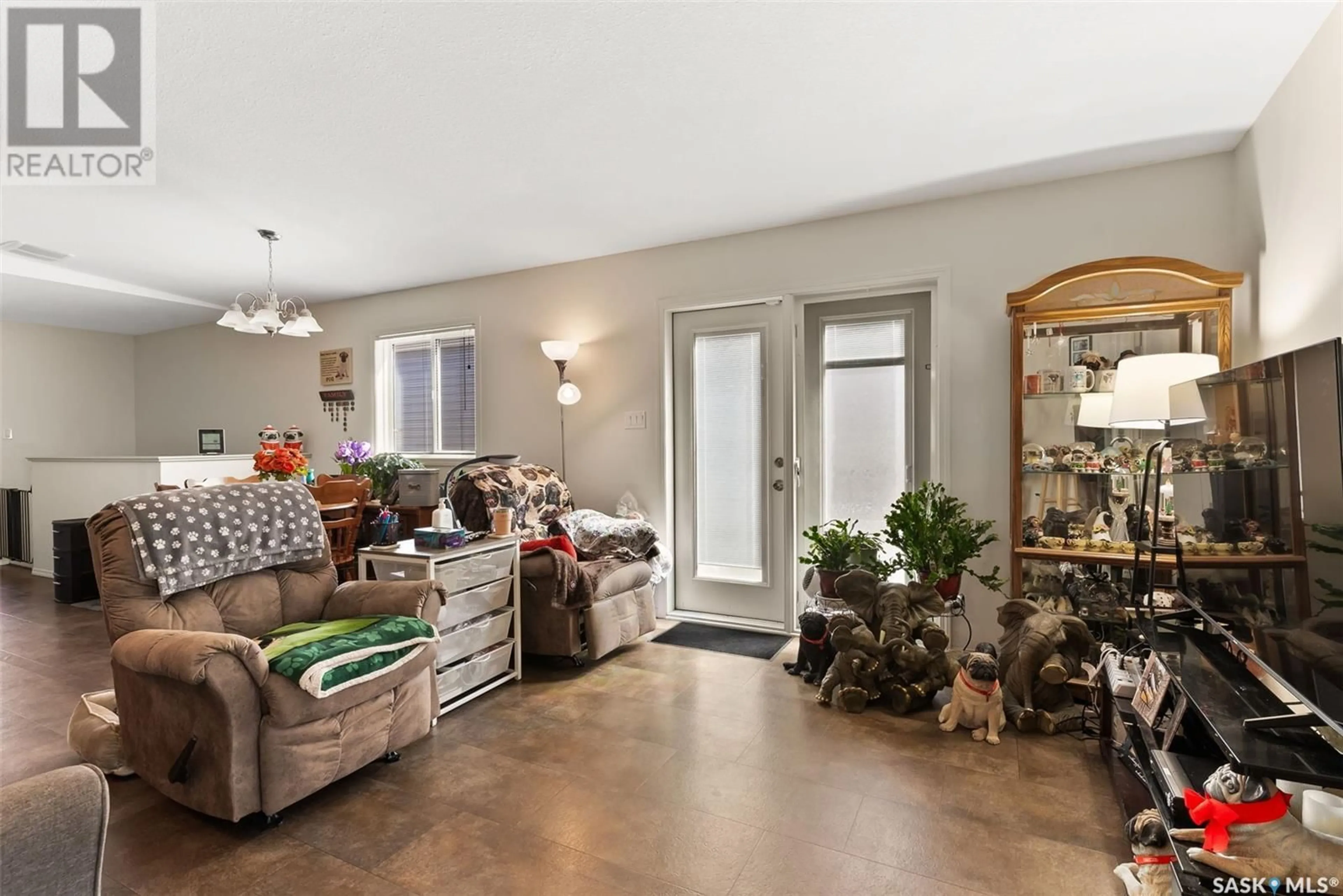 Living room with furniture, unknown for 195 CHATEAU CRESCENT, Pilot Butte Saskatchewan S0G3Z0